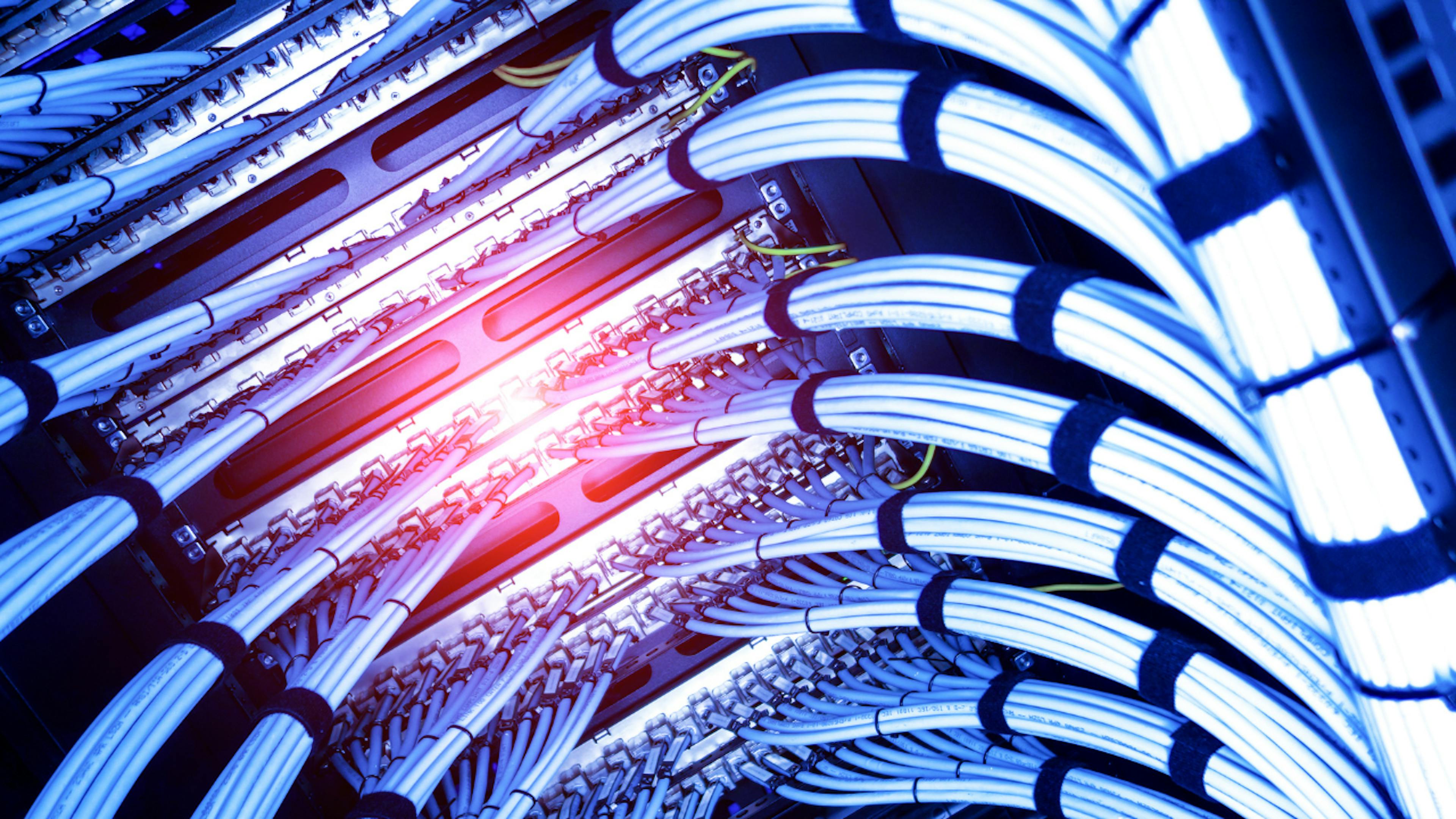 Example of Fiber Optic cables connecting to a server rack