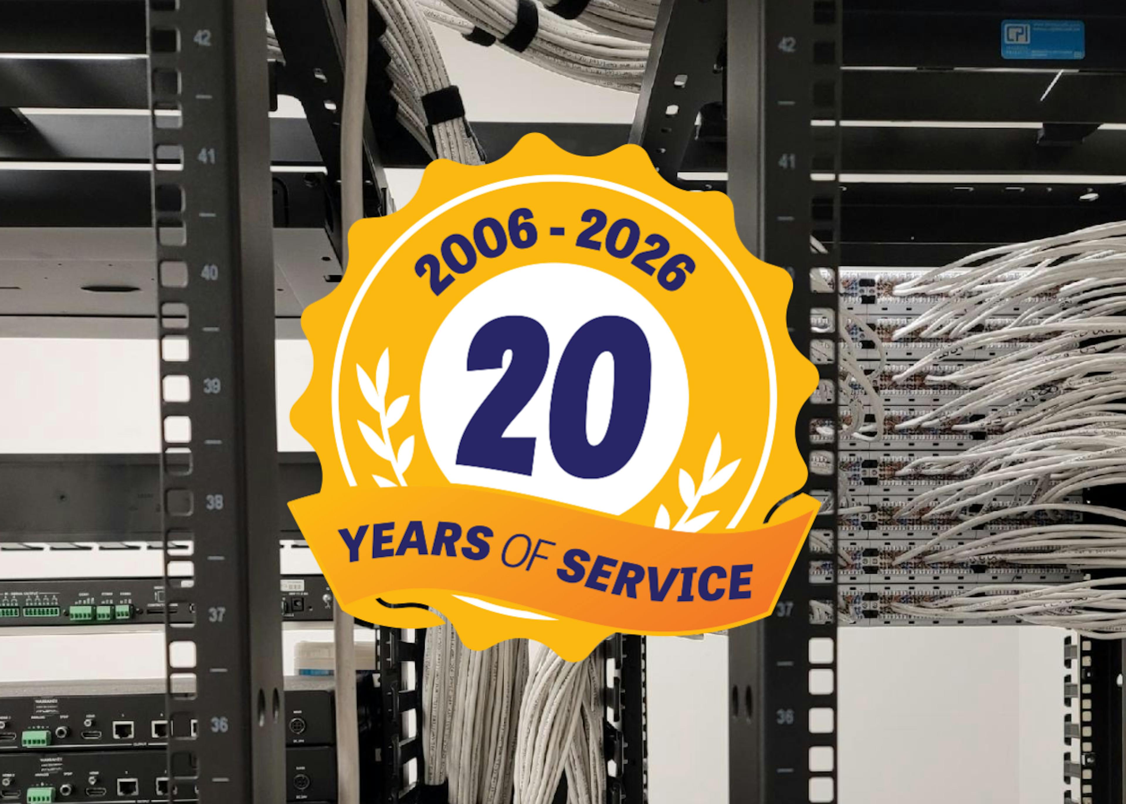 20th anniversary logo over a server rack