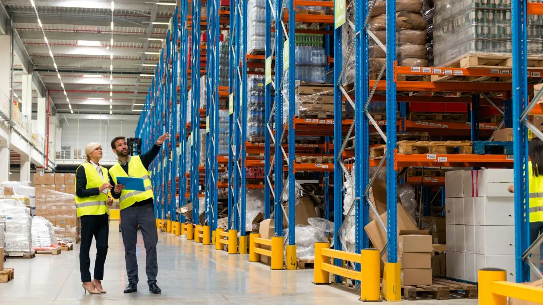 two workers in a warehouse