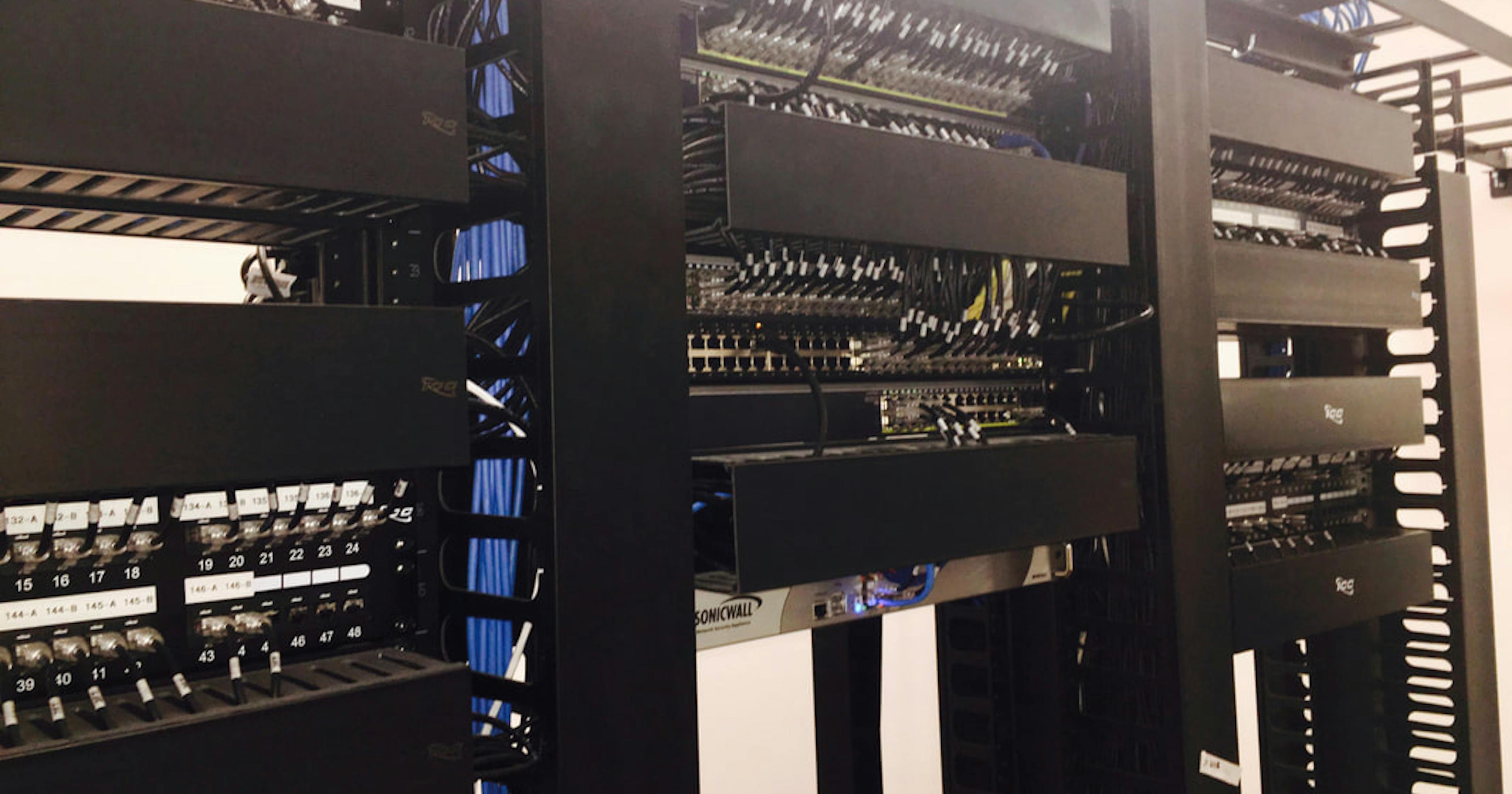 An example of our data cabling installation with network cables on a server rack