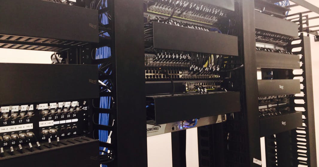 An example of our data cabling installation with network cables on a server rack