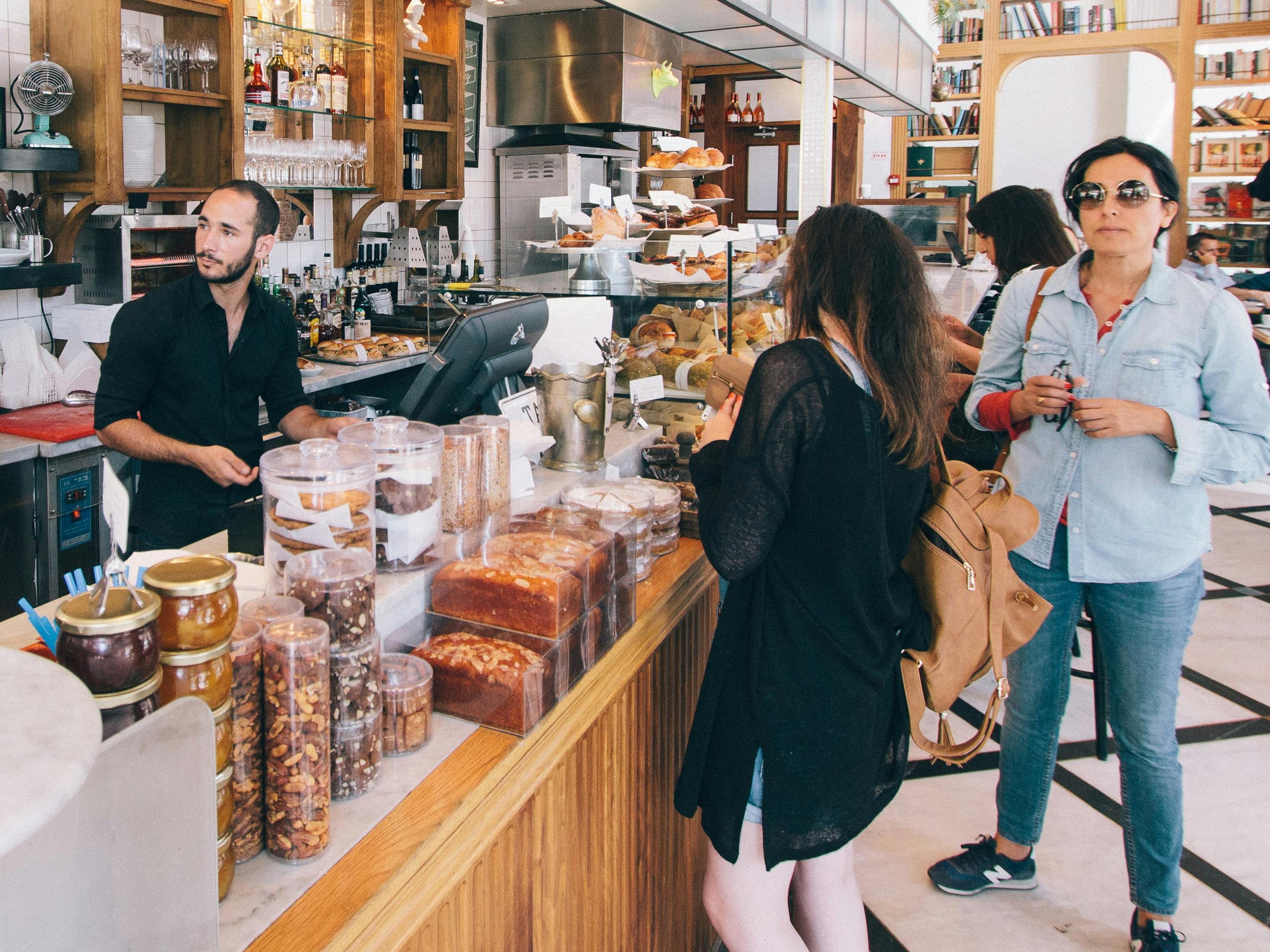 A busy cafe with customers waiting for your orders