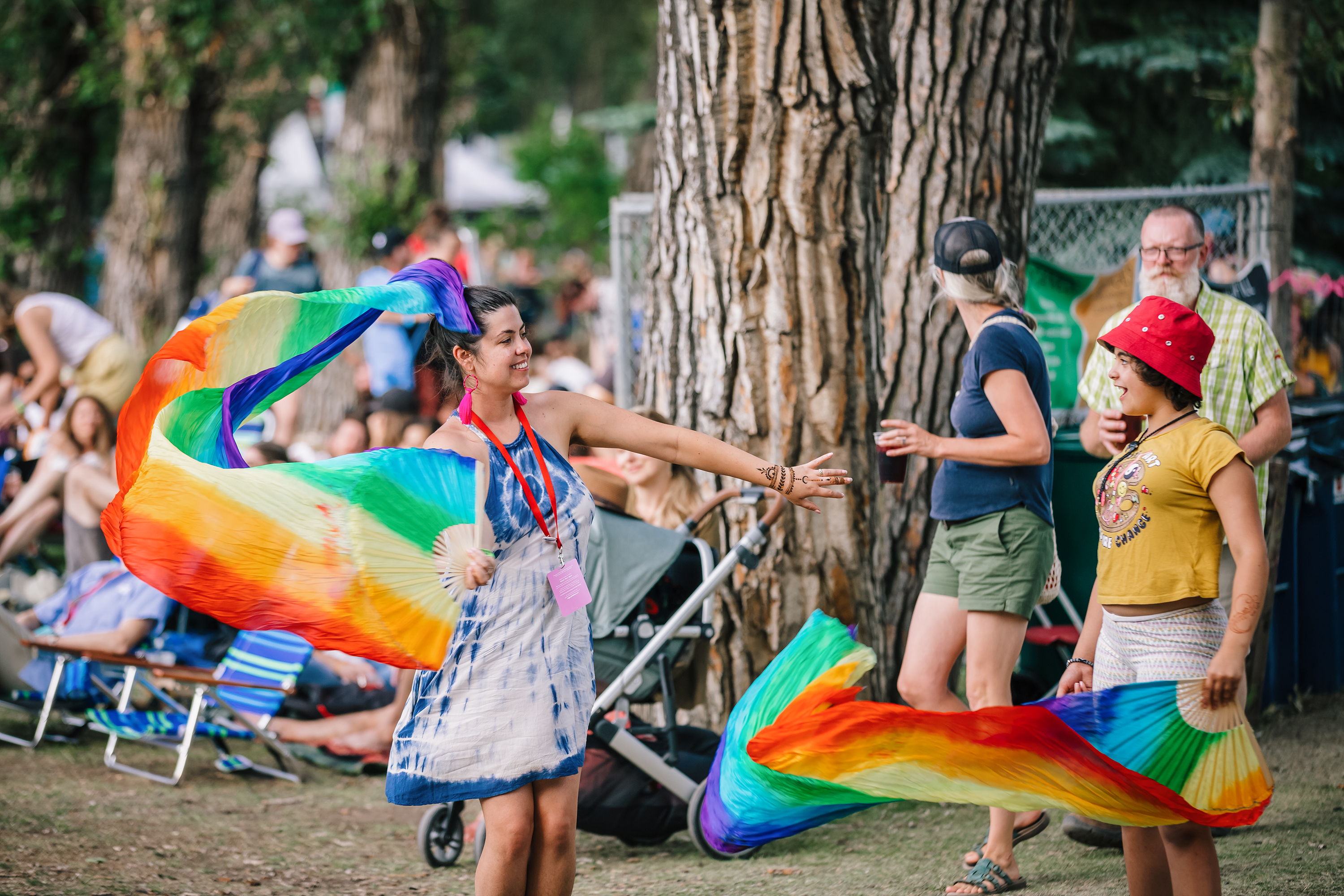 Attendees smile and dance at the Calgary Folk Fest.