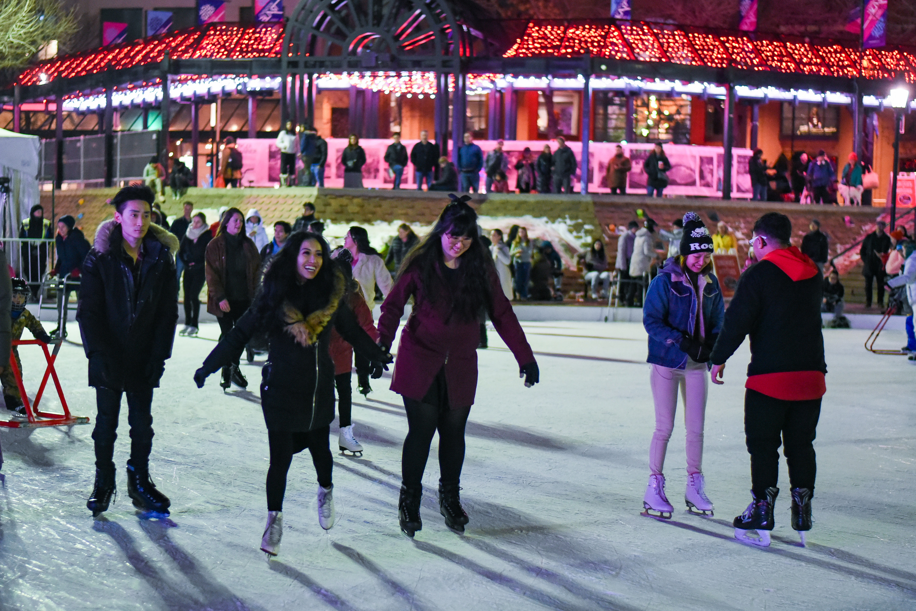 Patrons skate on the ice at Olympic Plaza during Chinook Blast and Block Heater