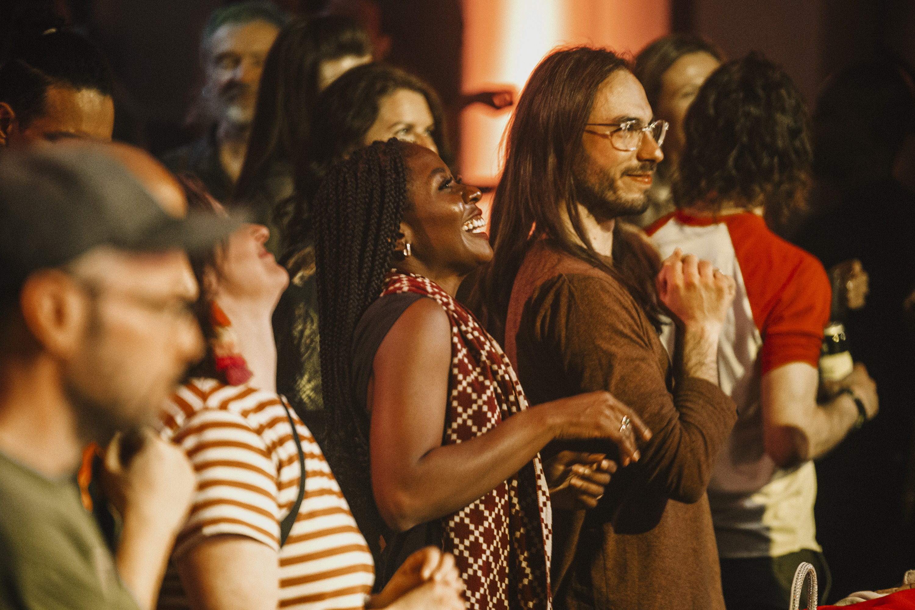 Audience members dance and smile at Block Heater 2023