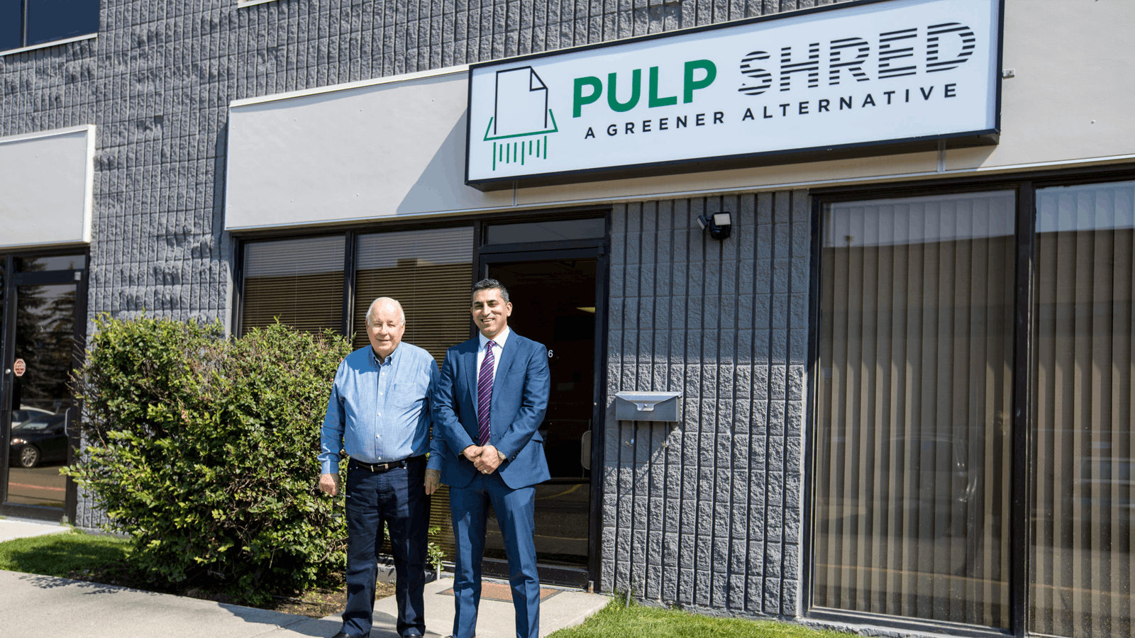 Pulp Shred co-founders Ankur Mahajan and Ken Waddell in front of their office