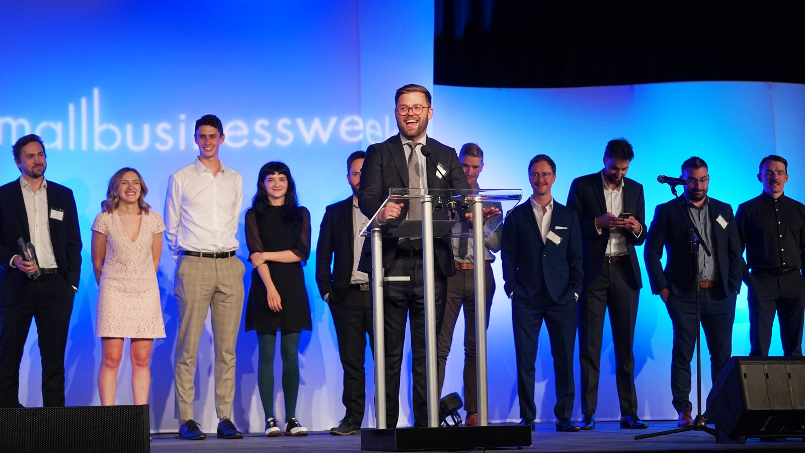 Goodlawyer CEO Brett Colvin and his team accepting the ATB Business of the Year Award at the Small Business Awards 2022.