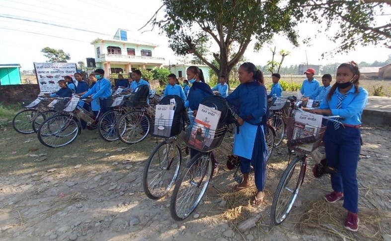 Dozens with their bicycles for safe transportation to and from school, provided by the GoodCall initiative.