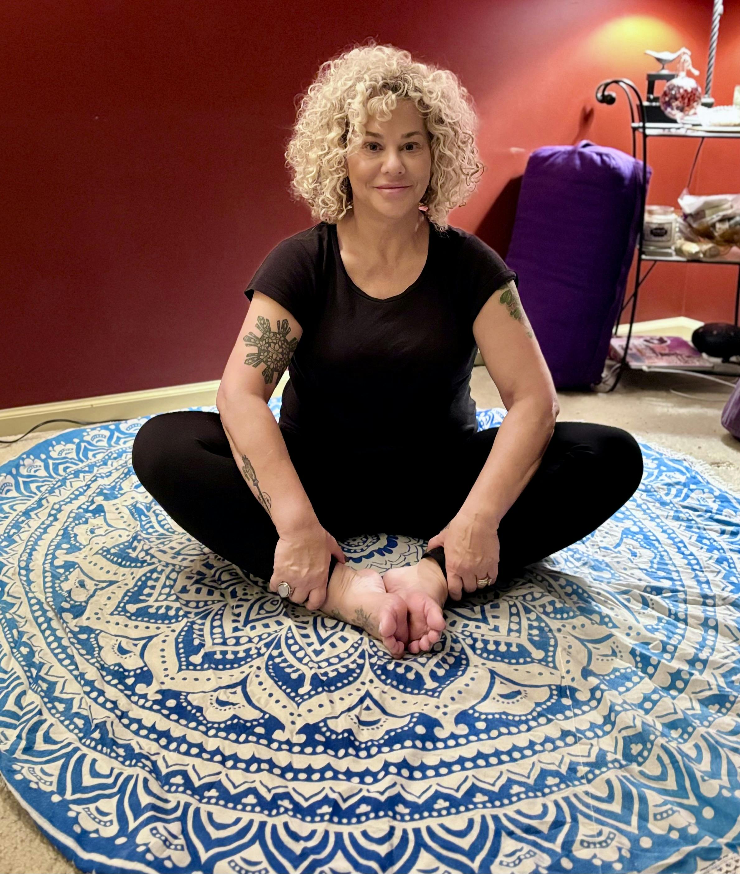 Vicki in her mediation and yoga home studio