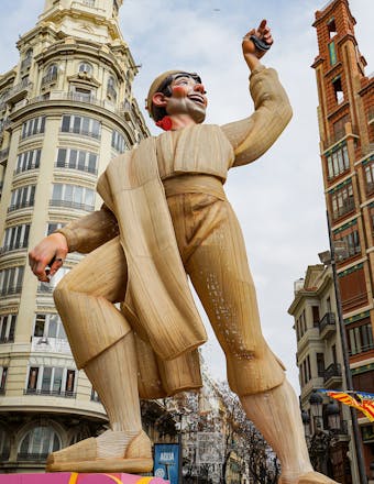 a falla of a gigantic man over 10 meters tall in the center of Valencia