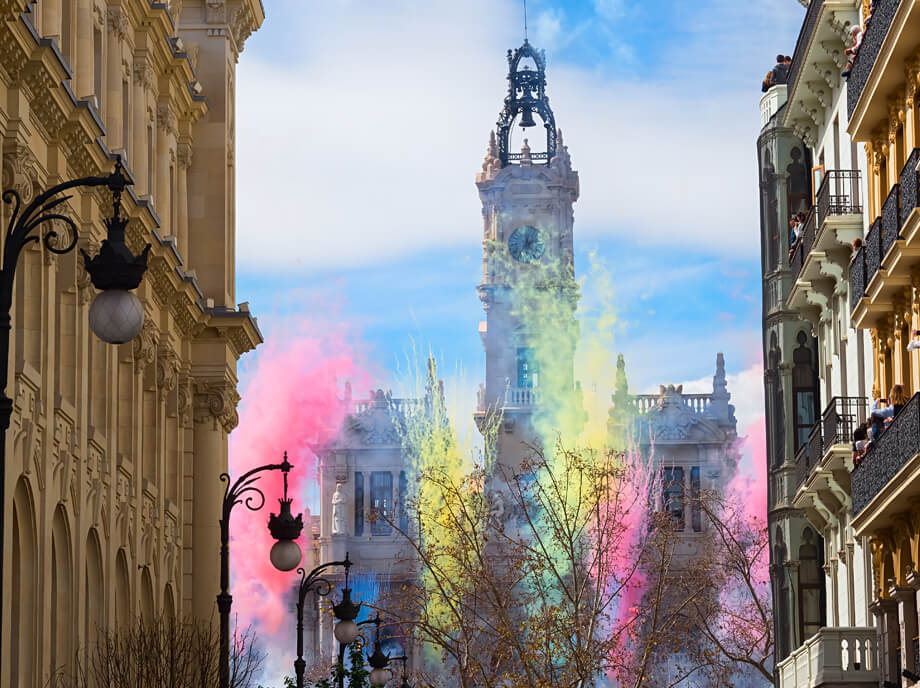 Valencia City Hall during Fallas, as a mascletà is launched, fireworks and a frenzy of noise