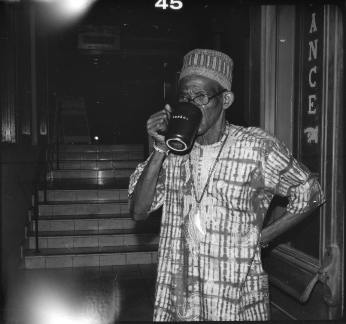 A man drinking his coffee