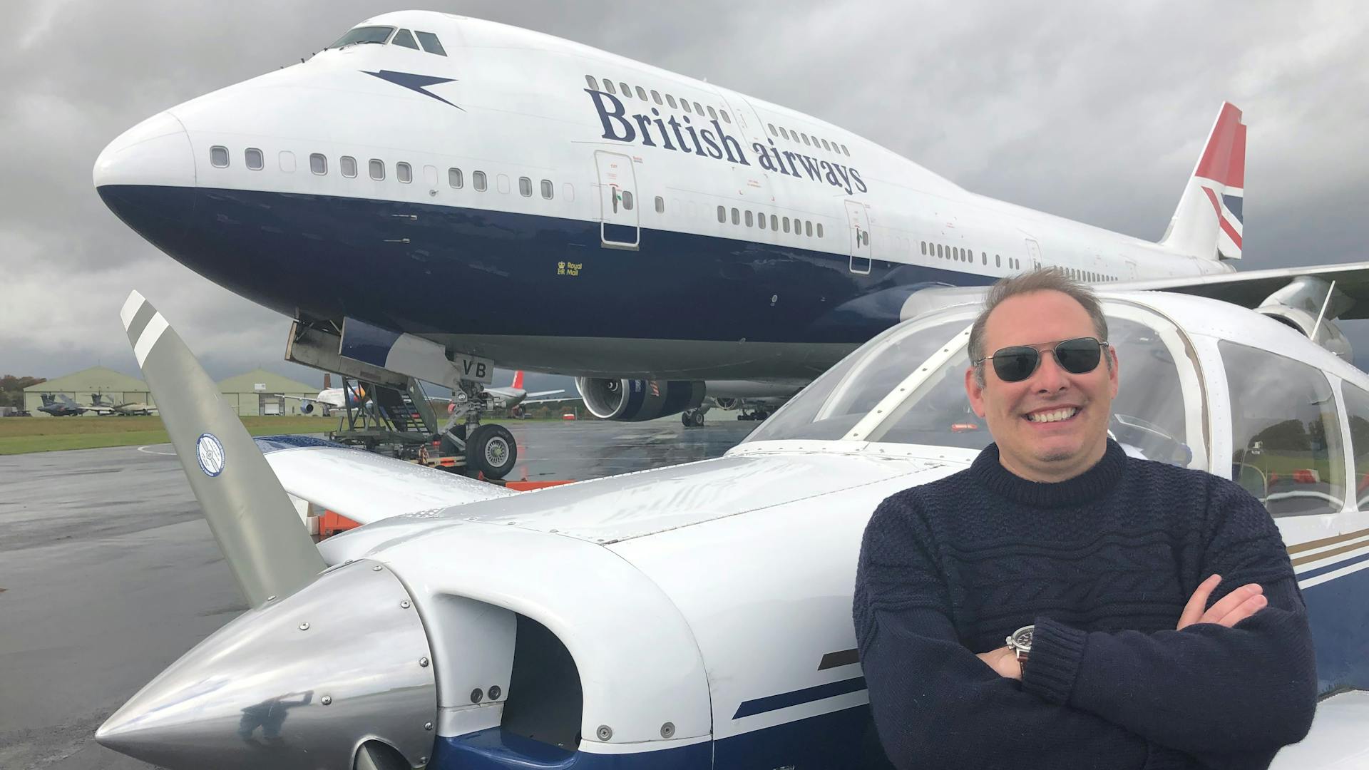 Our head of flight operations, Christian Ackroyd, stands in front of a BA Boeing 747.