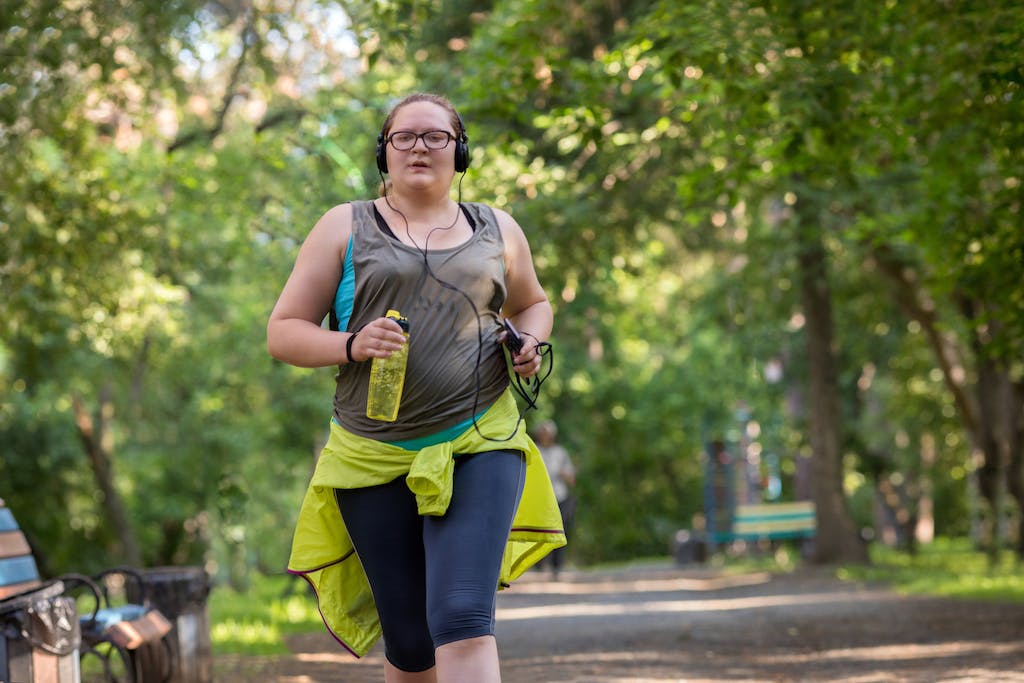 Overweight woman running