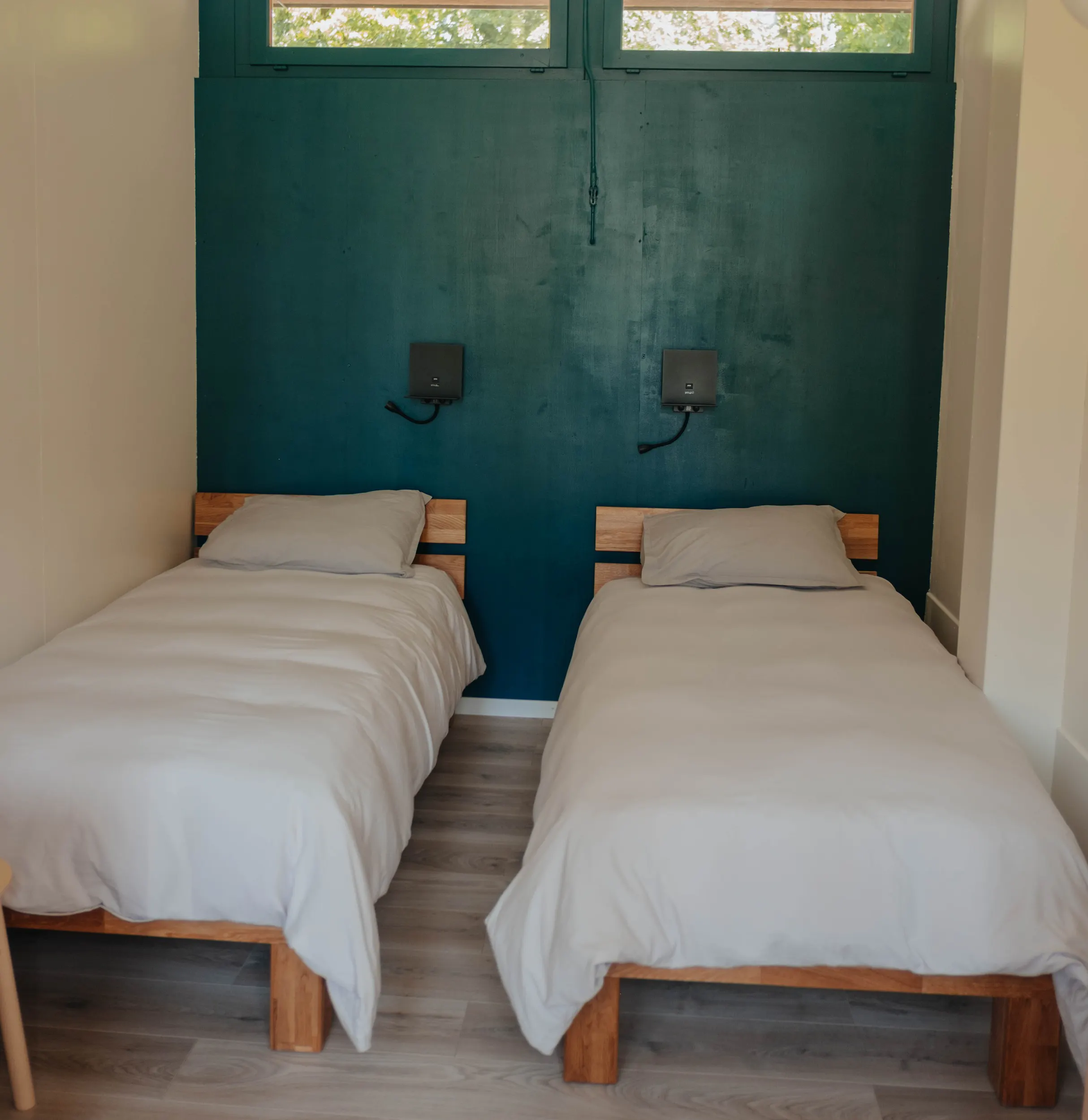 Two beds in the accommodation le Nook at Camping Lausanne