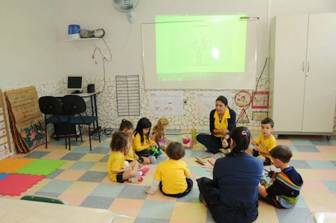 Photo of students studying using technology