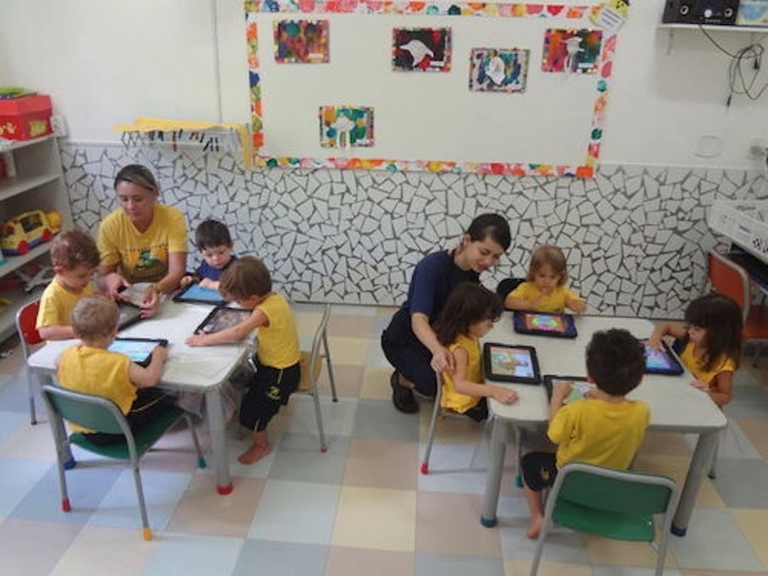 Photo of students studying using technology