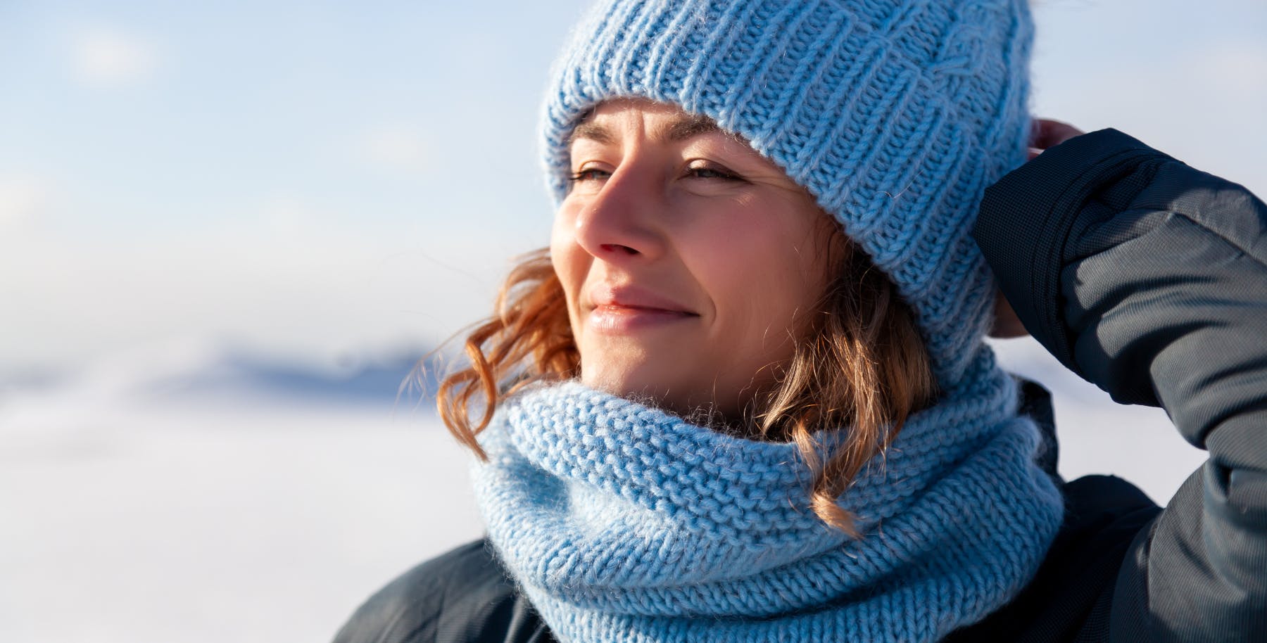 Woman enjoying winter sun