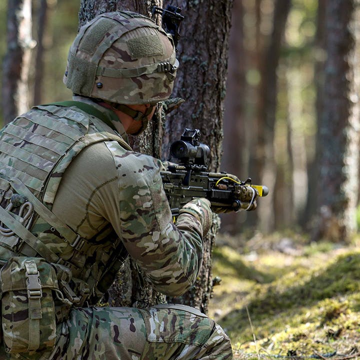 Solider in a forest.