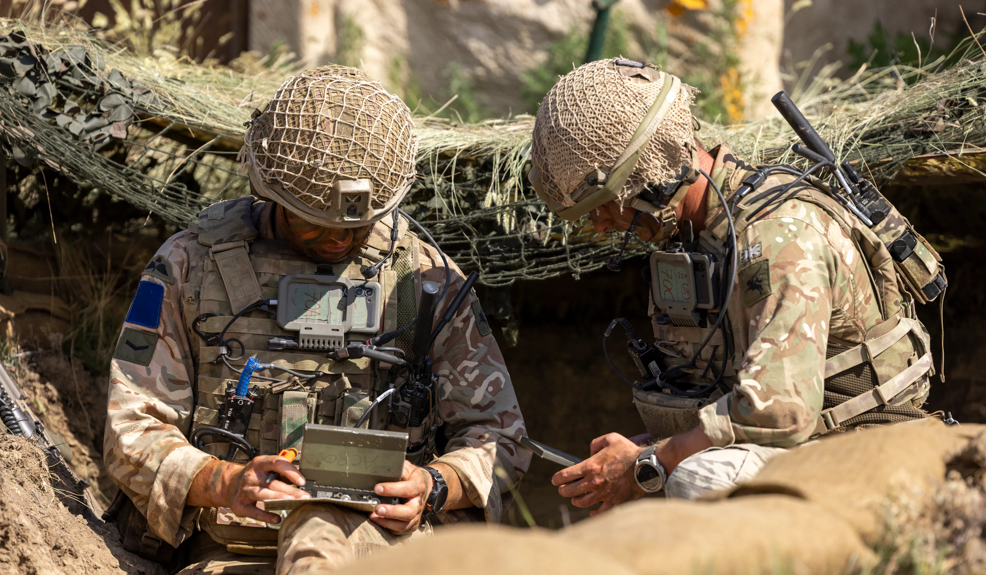 Soldiers from 2nd Battalion, The Parachute Regiment adjust the trajectory of a mortar during Exercise Rhino Bizz at British Army Training Unit Suffield in Canada.