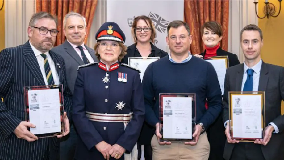 Mark Hawkins picks up the military covernant certificate on behalf of Canny