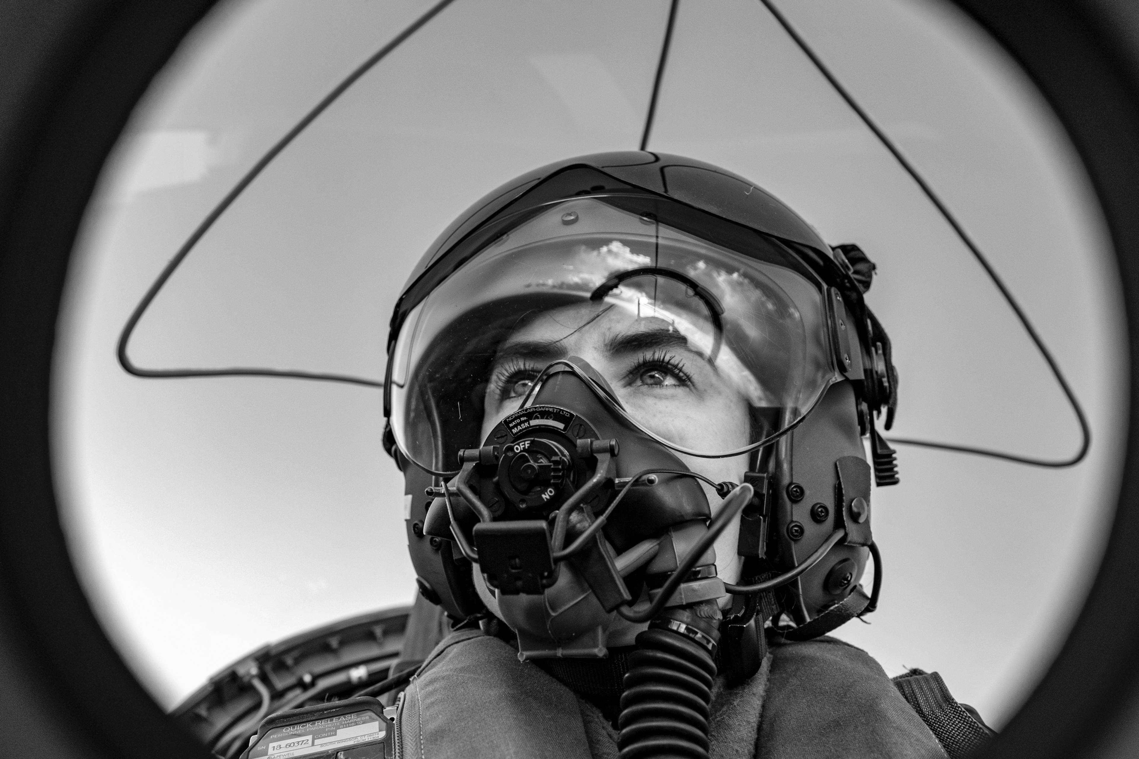 A pilot in a fighter jet.
