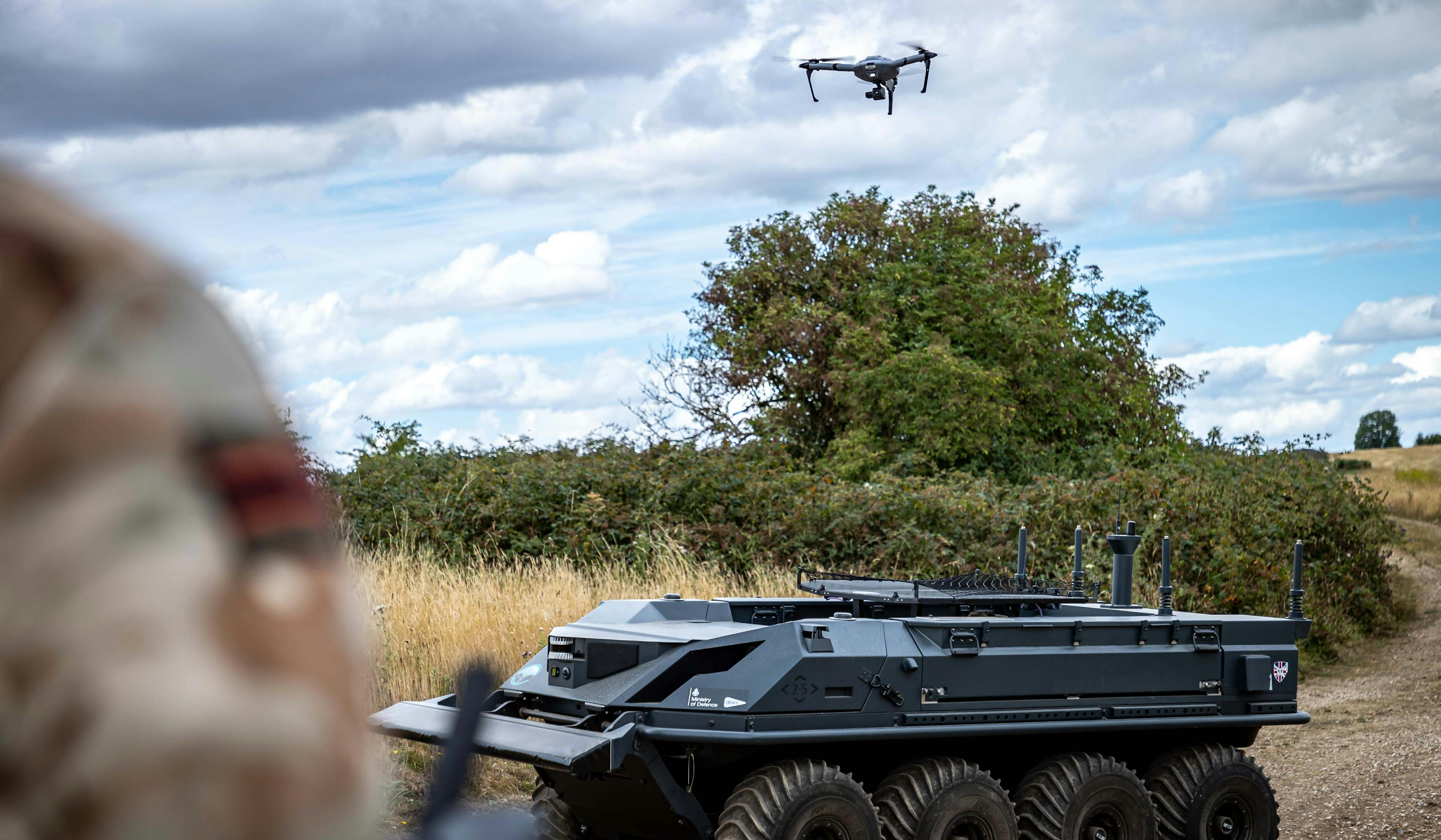 Uncrewed ground vehicle with uncrewed aerial vehicle. Crown copyright.
