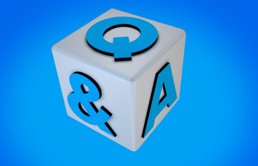 Graphic of a dice with three of the sides being Q, &, and A.