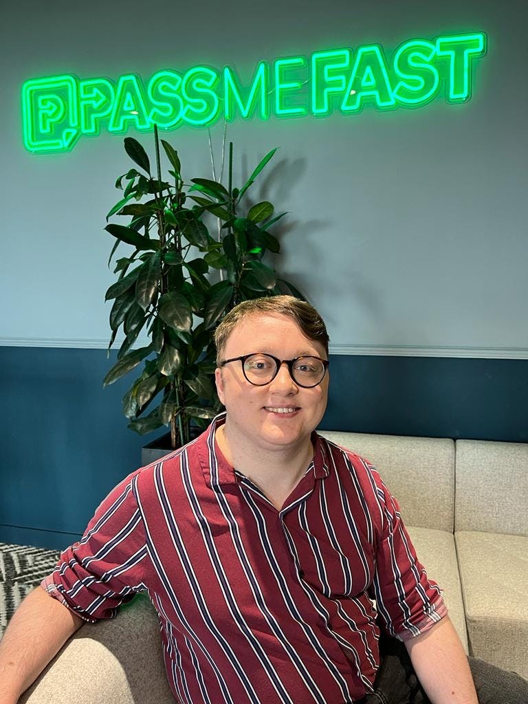 Man in a shirt, smiling