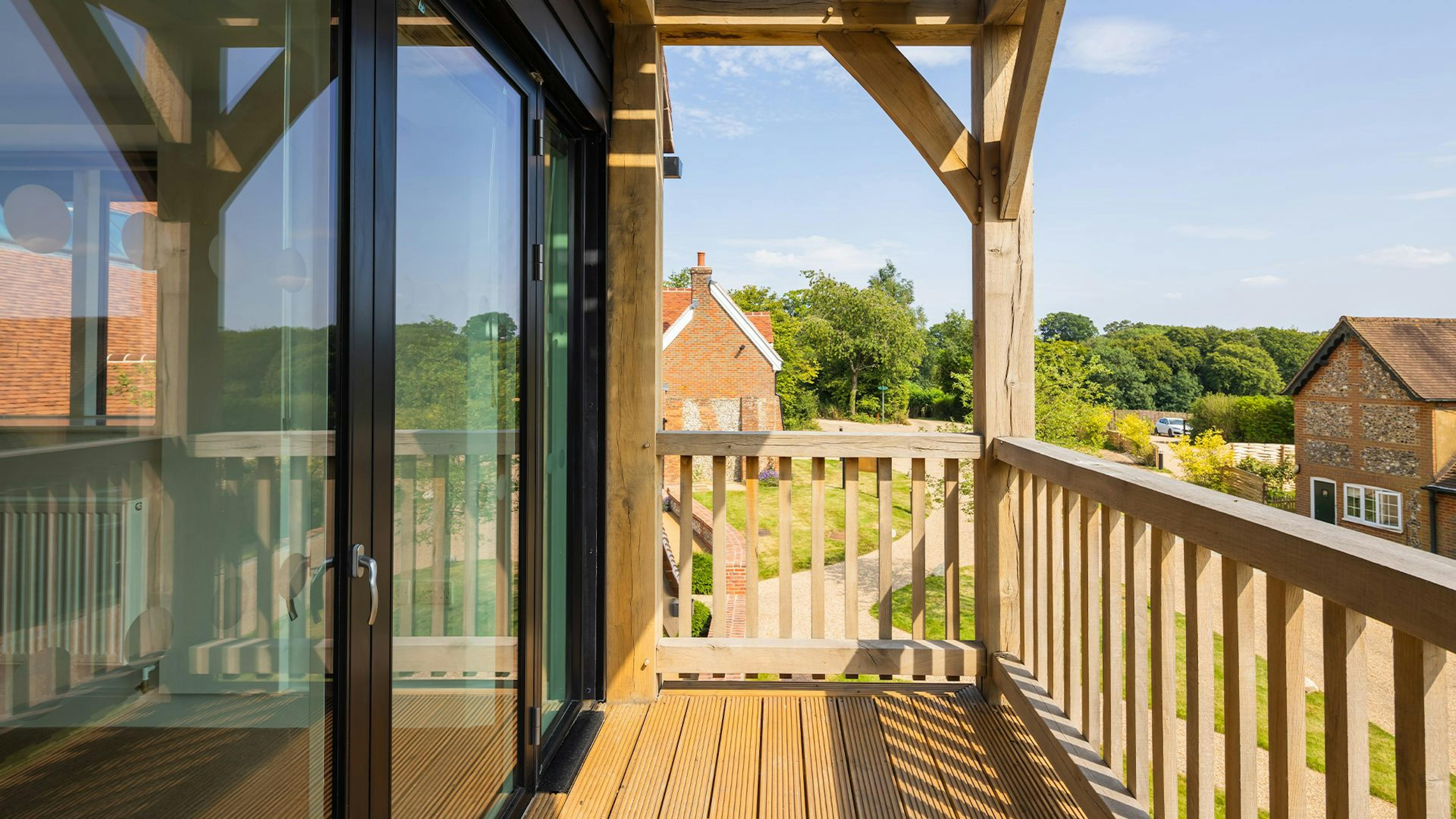 A large oak balcony on the front of a large building