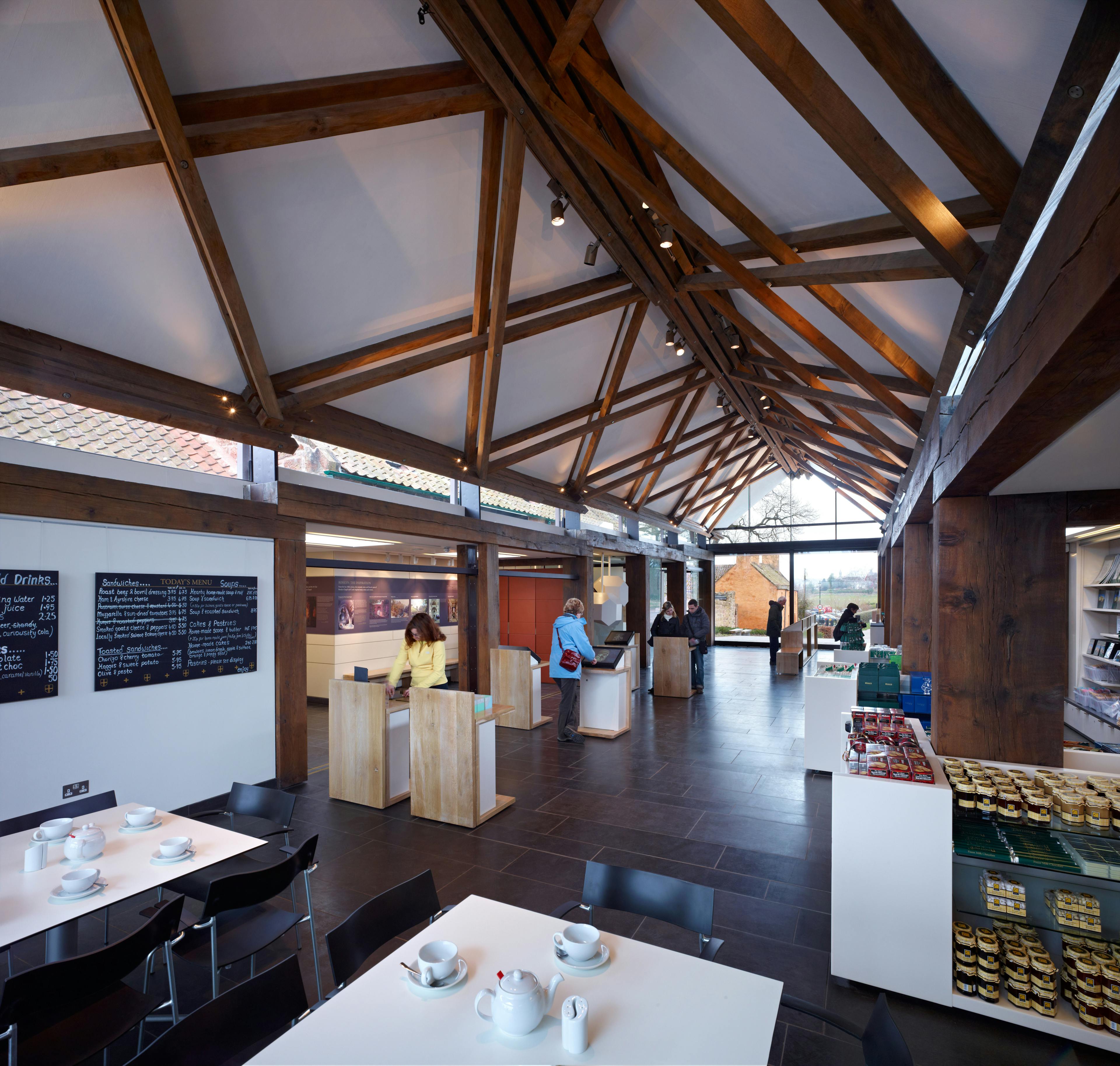 Internal view of Rosslyn Chapels Visitors centre with intricate stained oak frame 