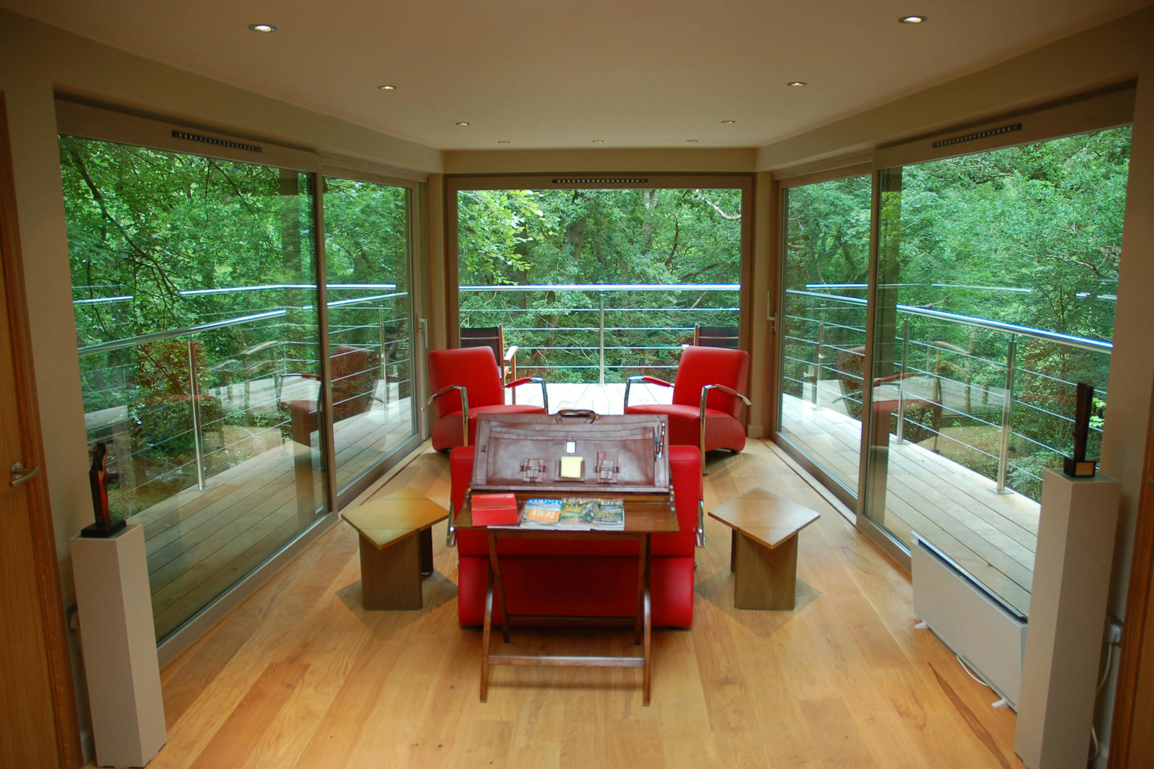 A Douglas fir framed cabin with sitting area
