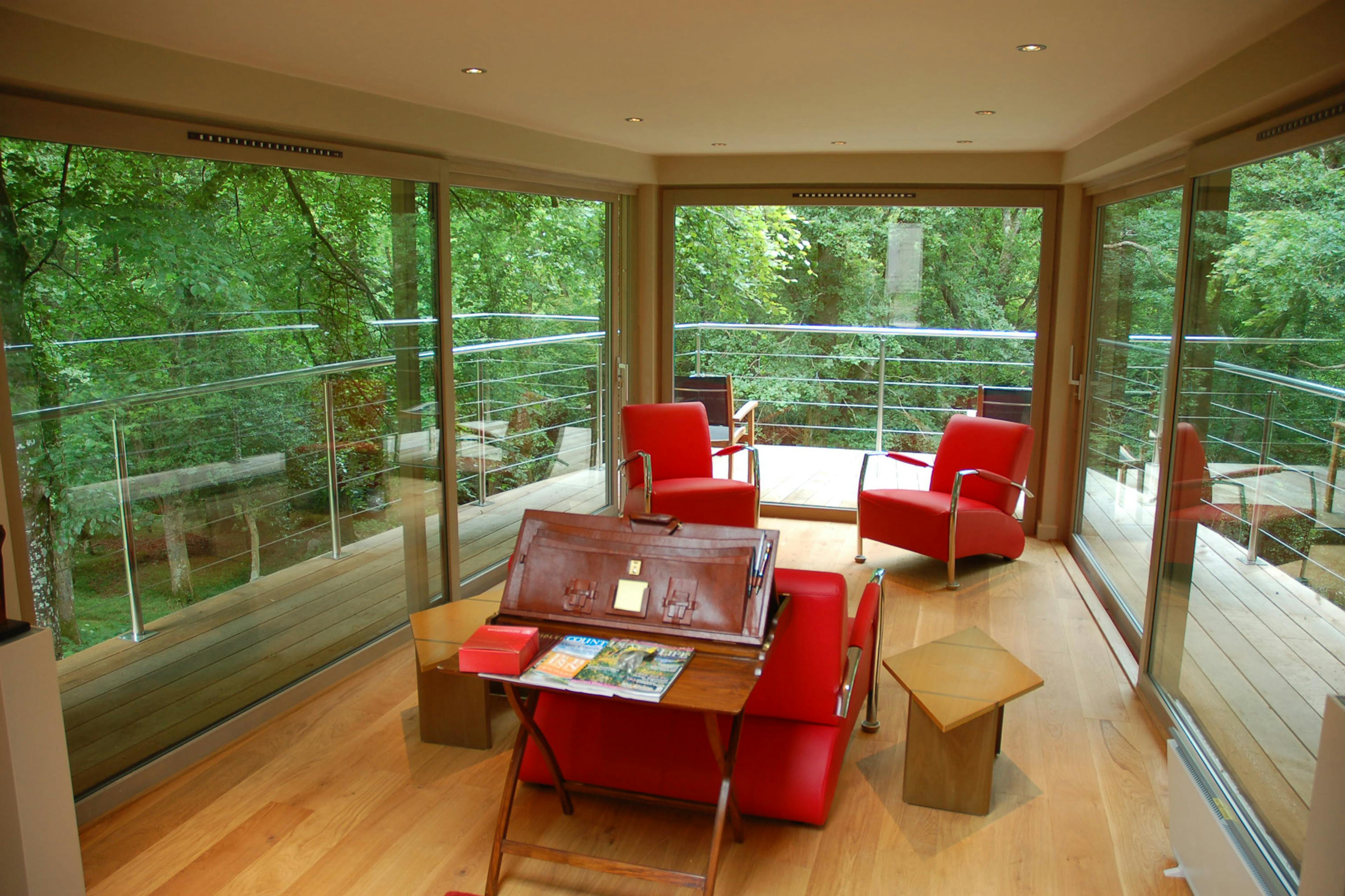 A Douglas fir framed cabin with sitting area