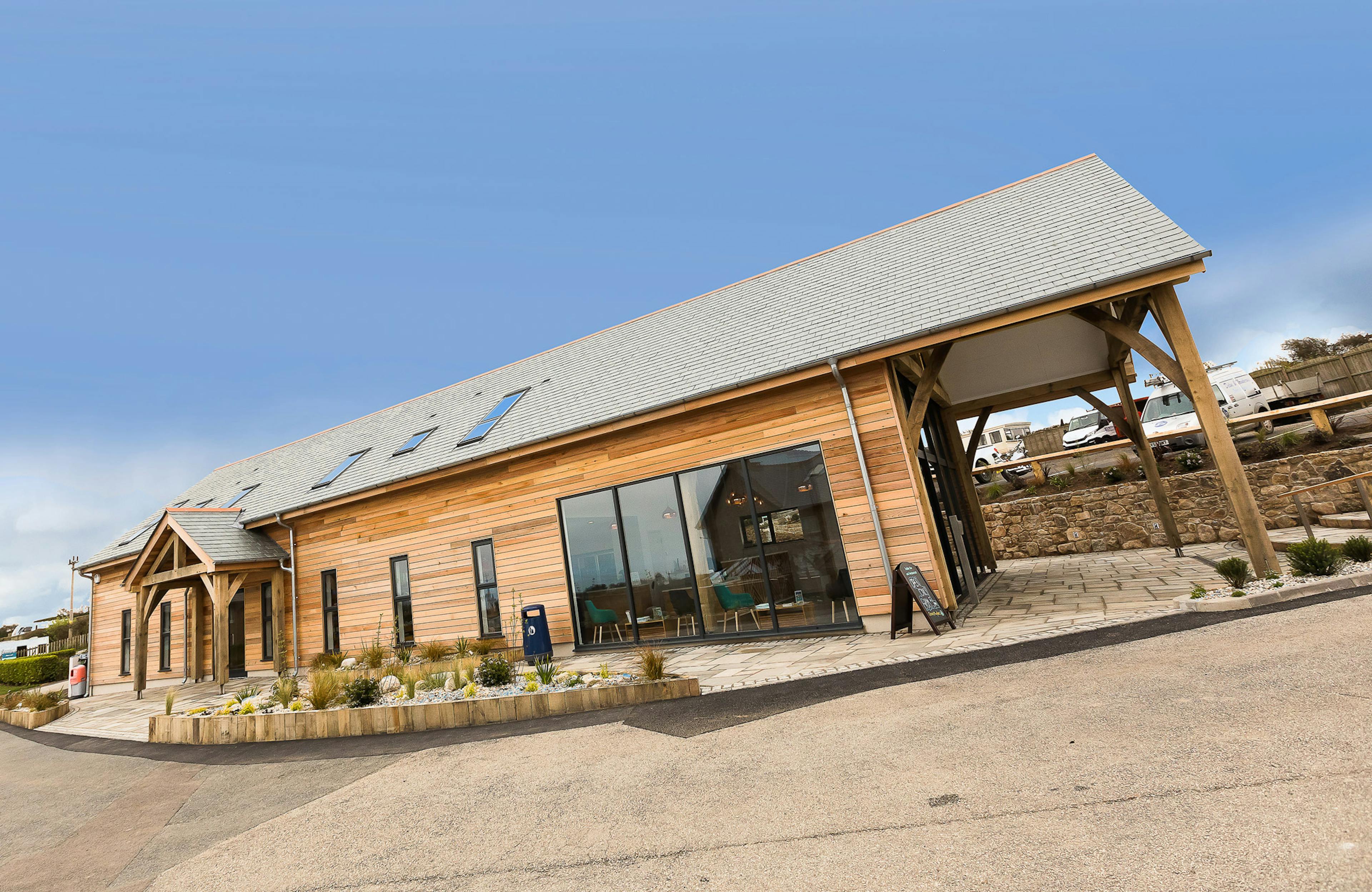 Th side of an oak framed entrance for a reception area at a caravan park