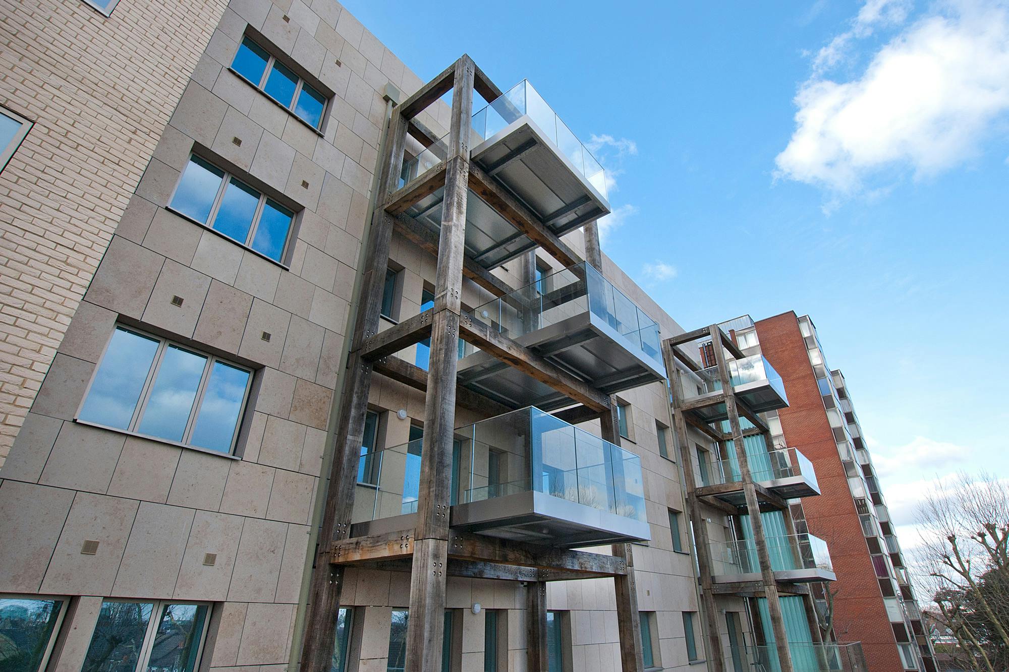 Green oak balconies on a high rise building