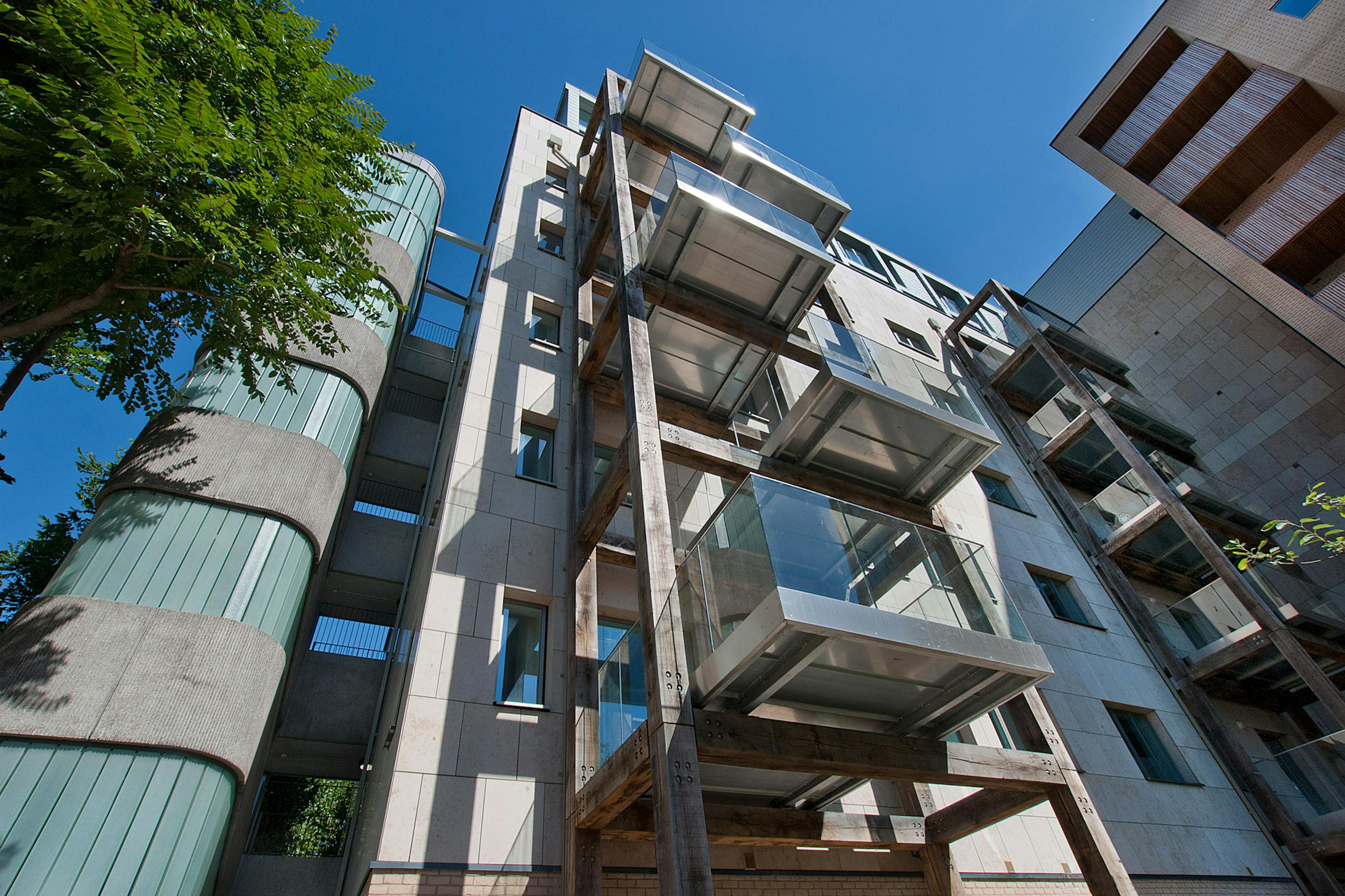 Green oak balconies on a high rise building