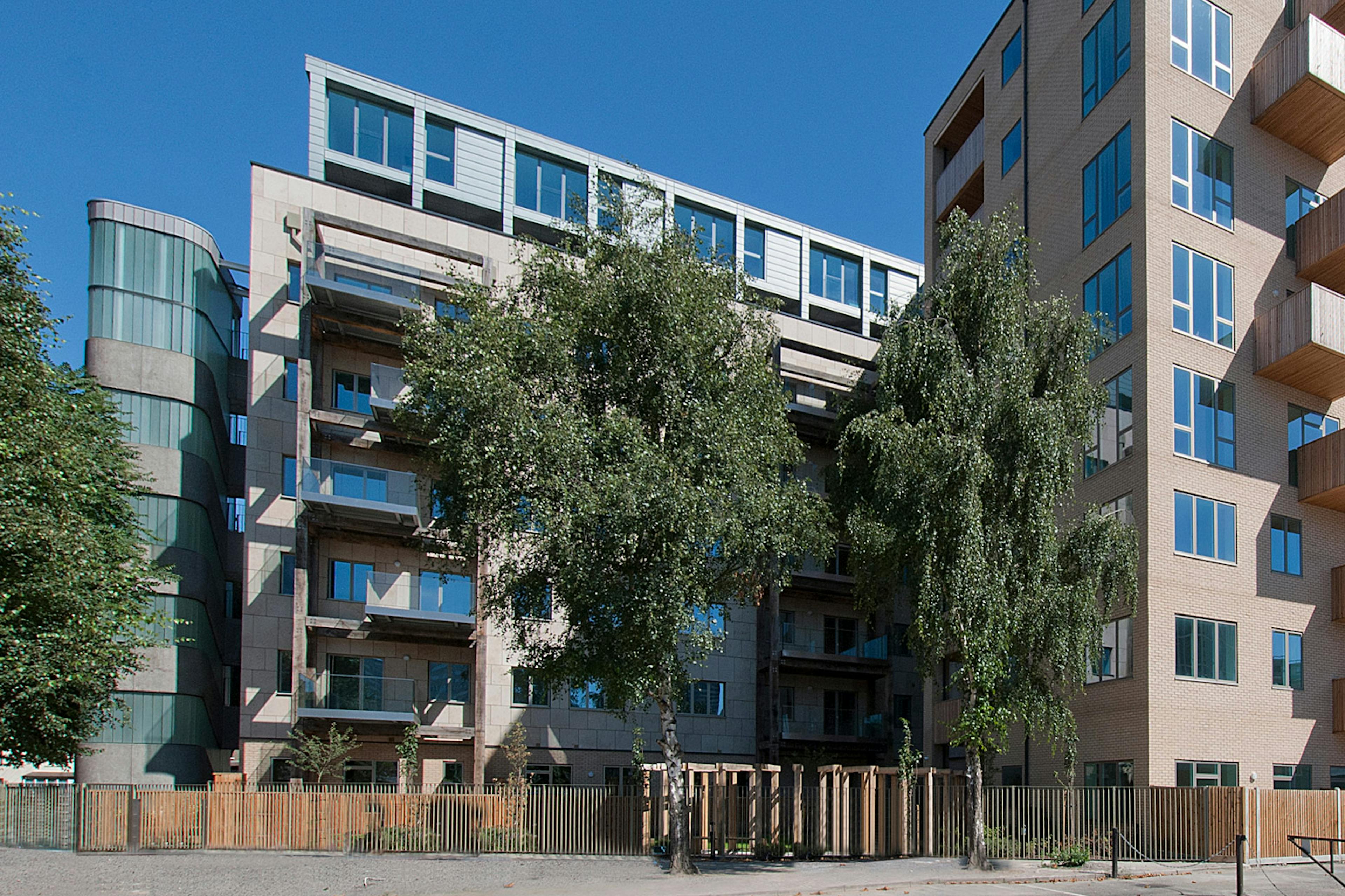 Green oak balconies on a high rise building