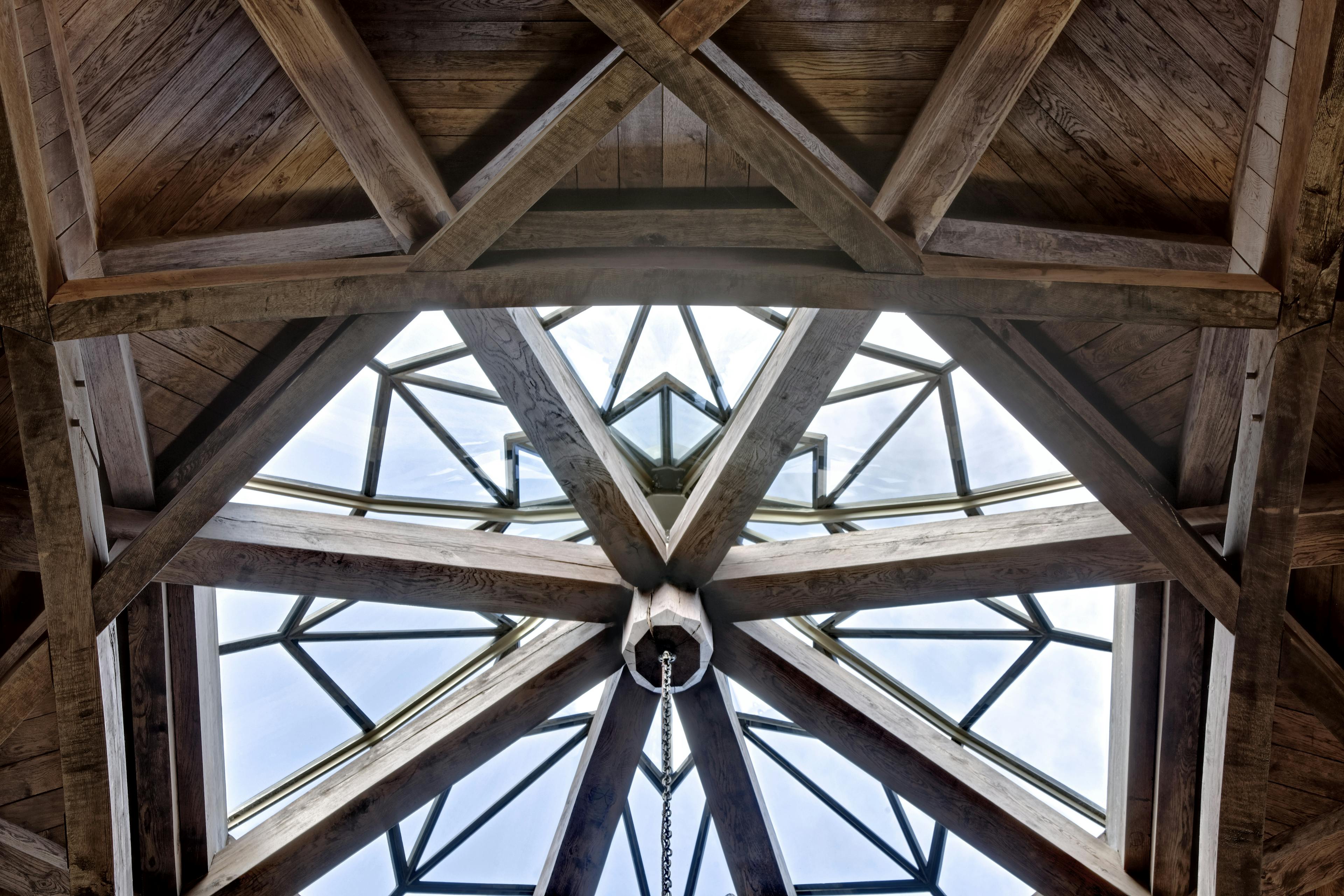 The glass within an octagonal oak roof structure