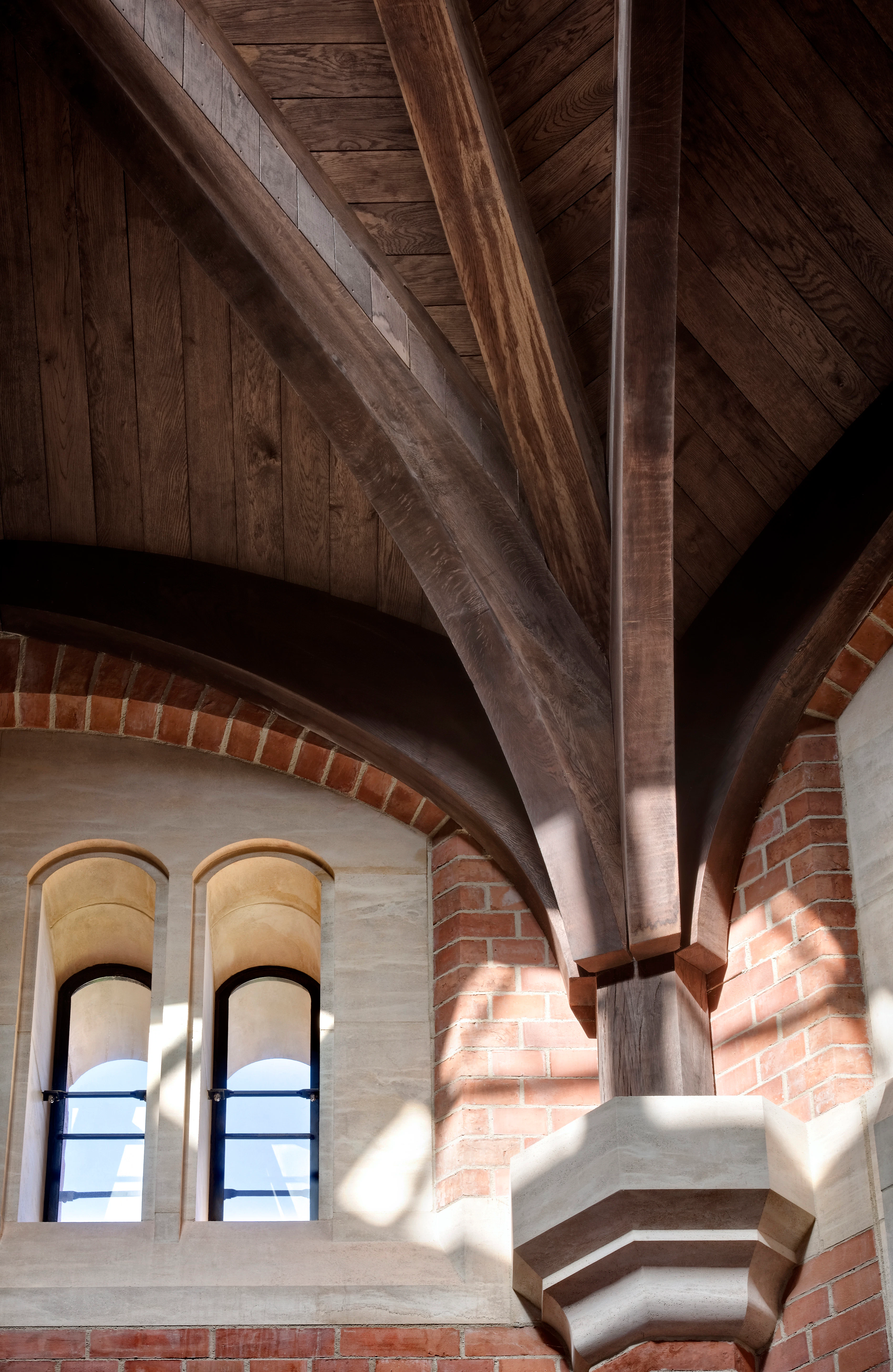 The detail on an octagonal oak roof structure