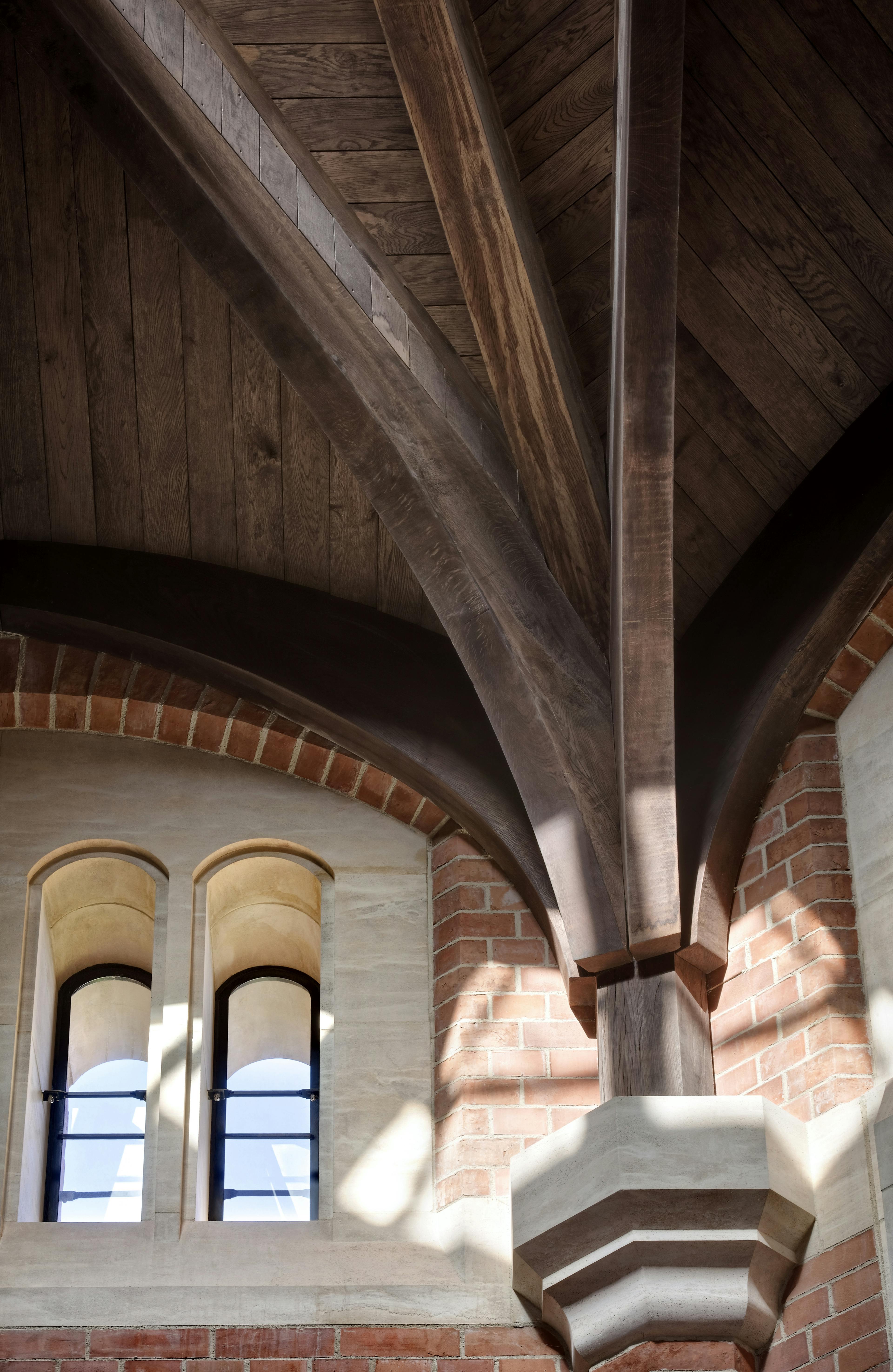 The detail on an octagonal oak roof structure