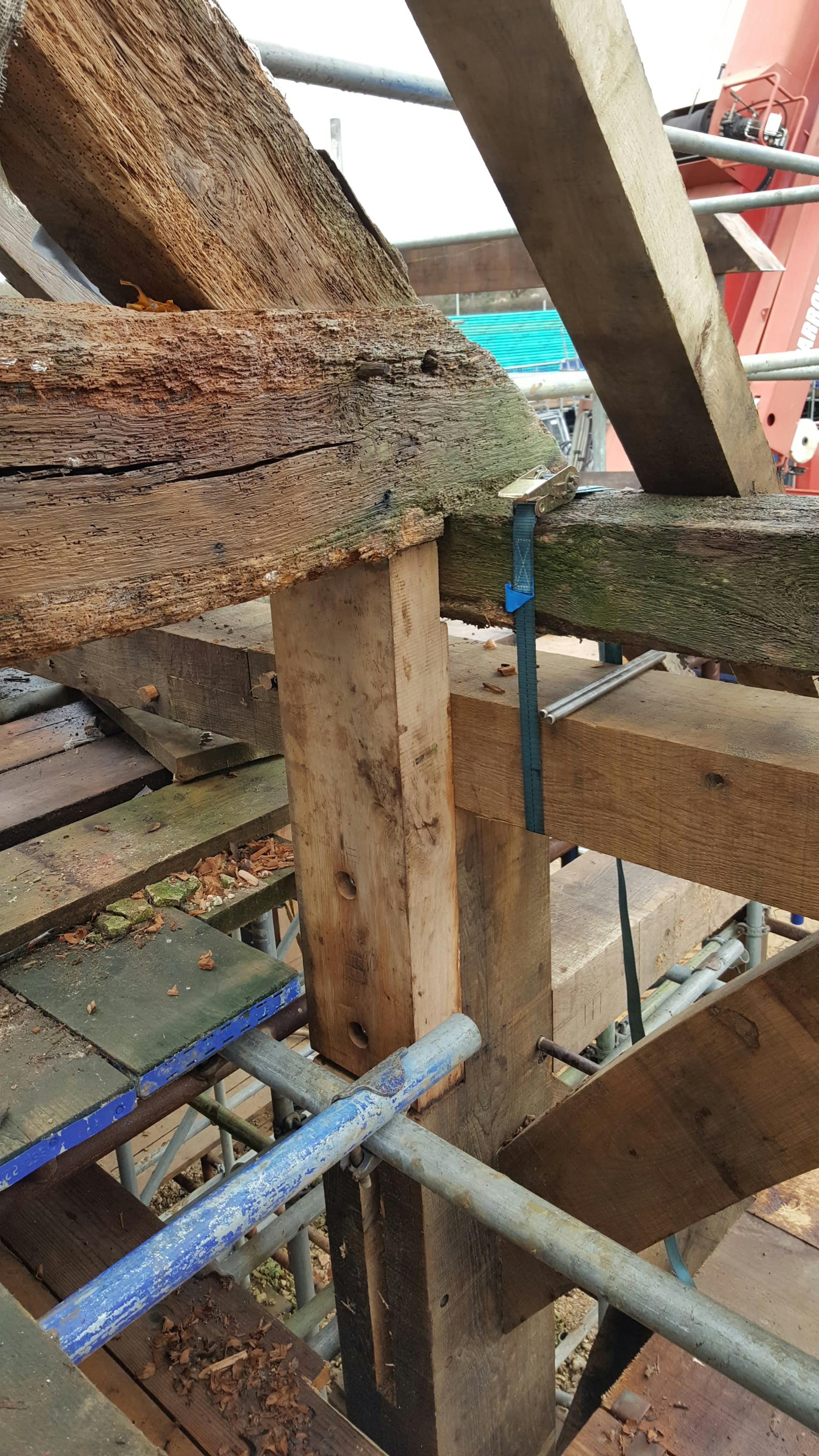 The detail of an oak framed wedding barn during restoration and installation 