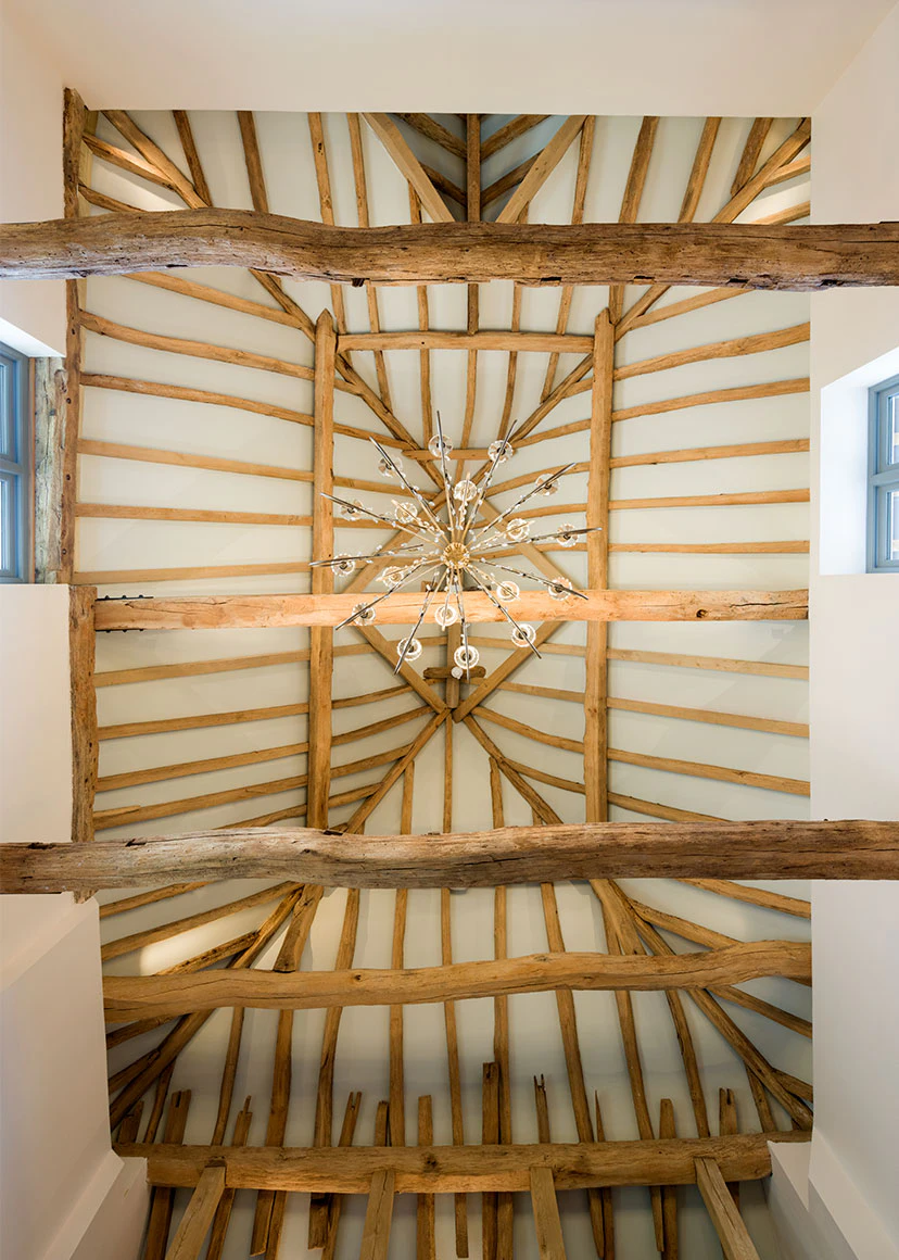 The ceiling of an oak framed wedding barn hall