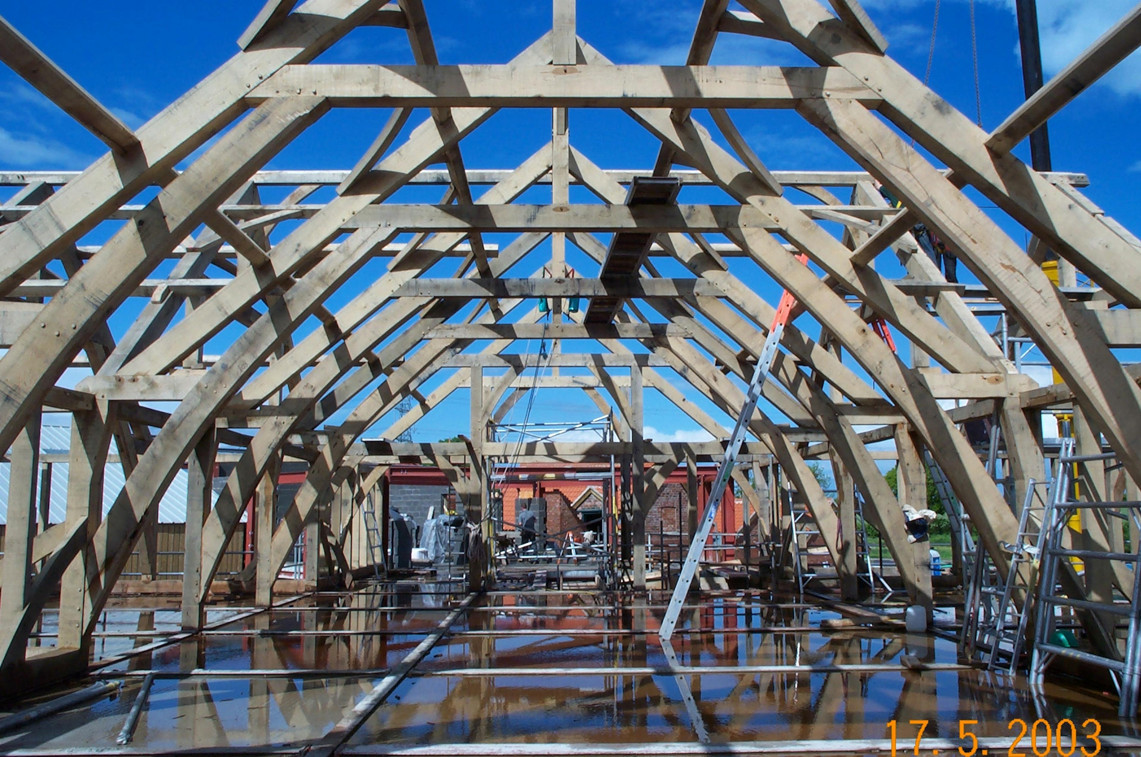 An oak framed wedding barn during construction