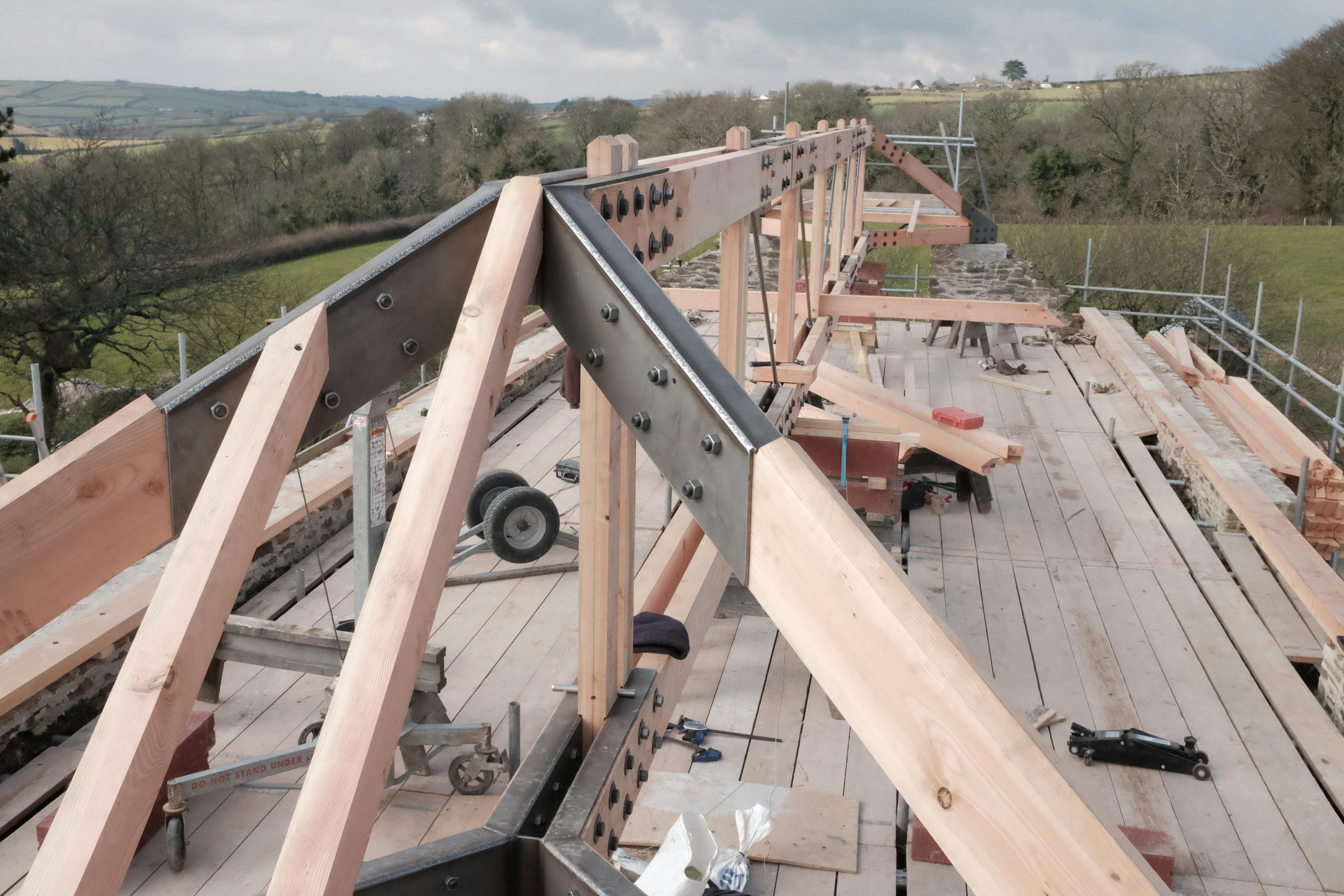 A Douglas fir frame with steel connections during renovation of a barn
