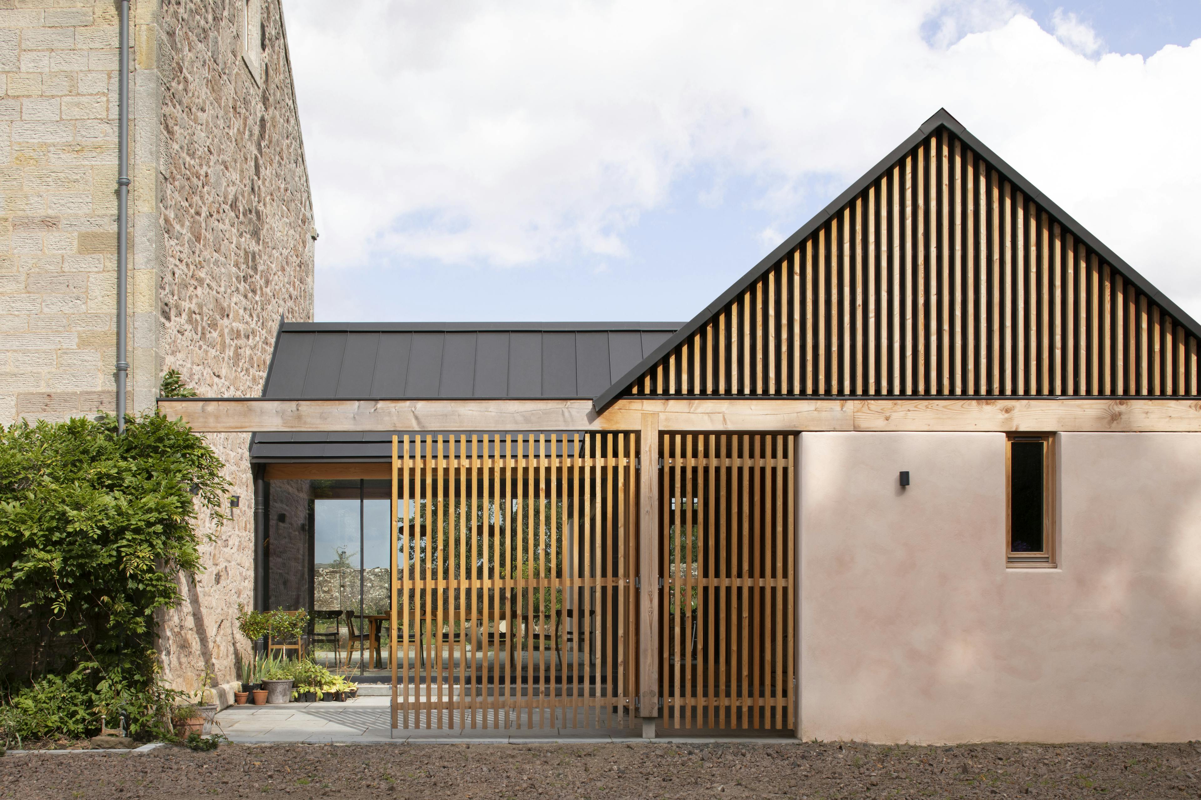 Douglas fir framed extension with glazing and brise soleil