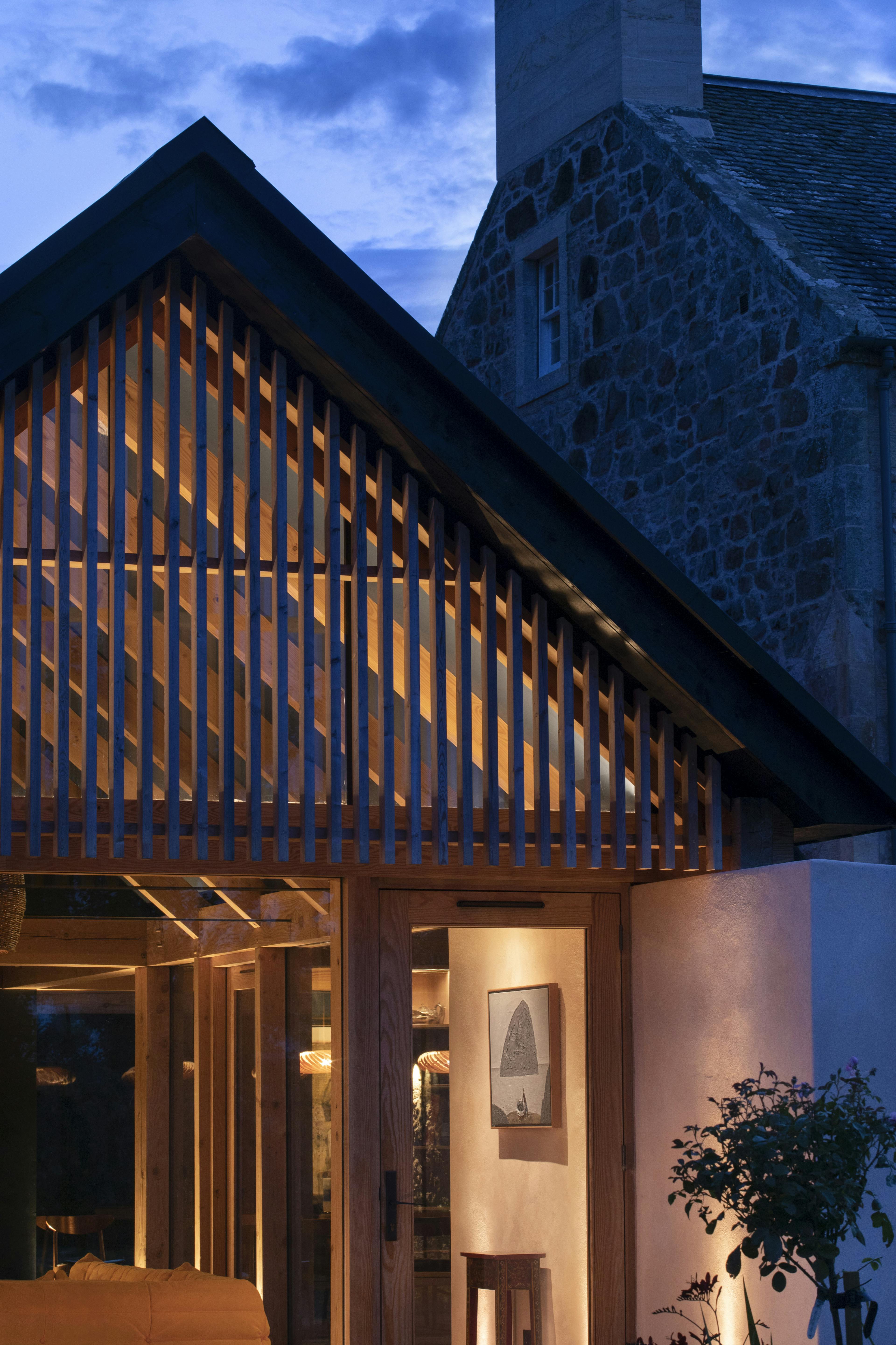 Douglas fir framed extension with glazing and brise soleil