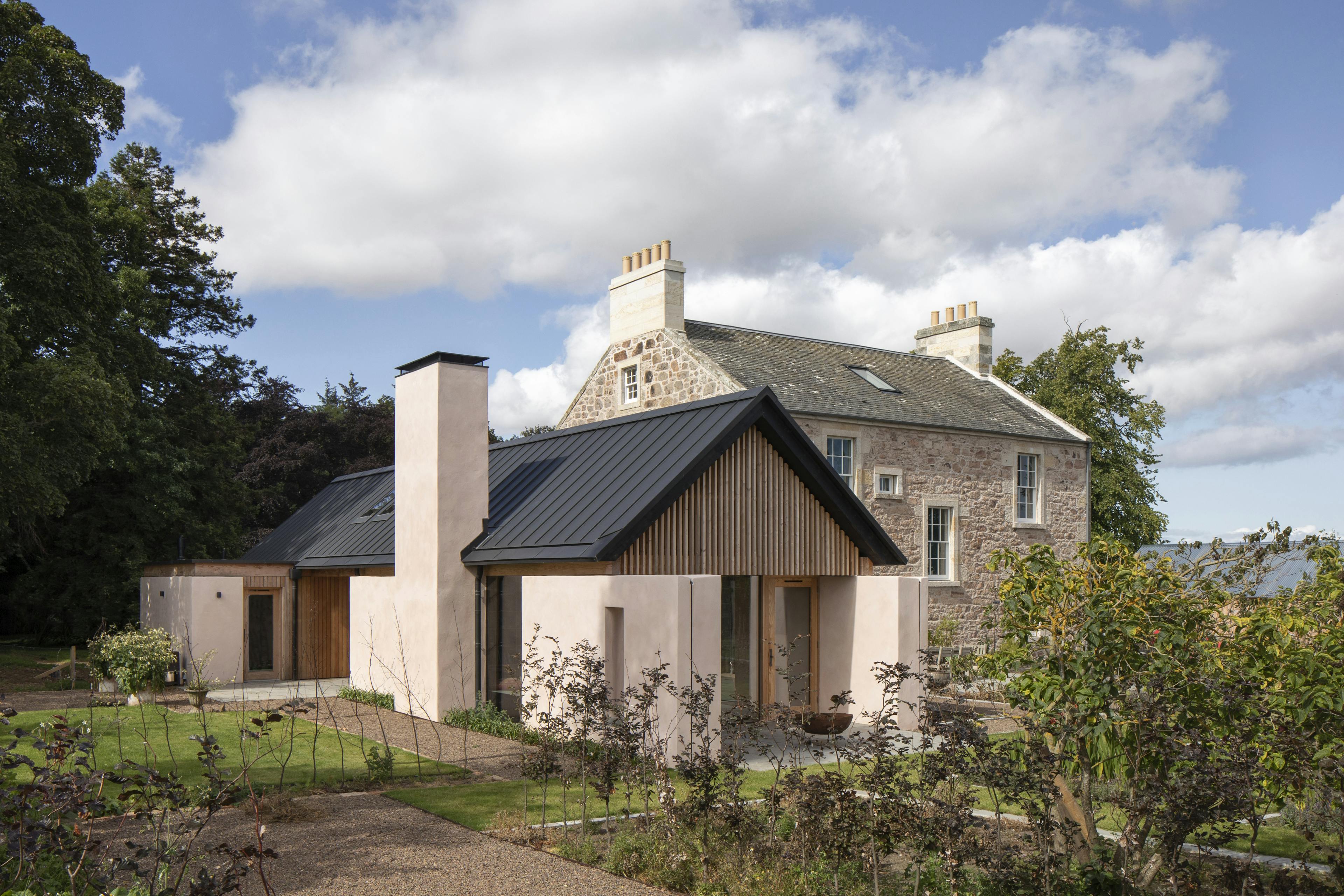 Douglas fir framed extension to a Georgian country manor house set in landscaped gardens