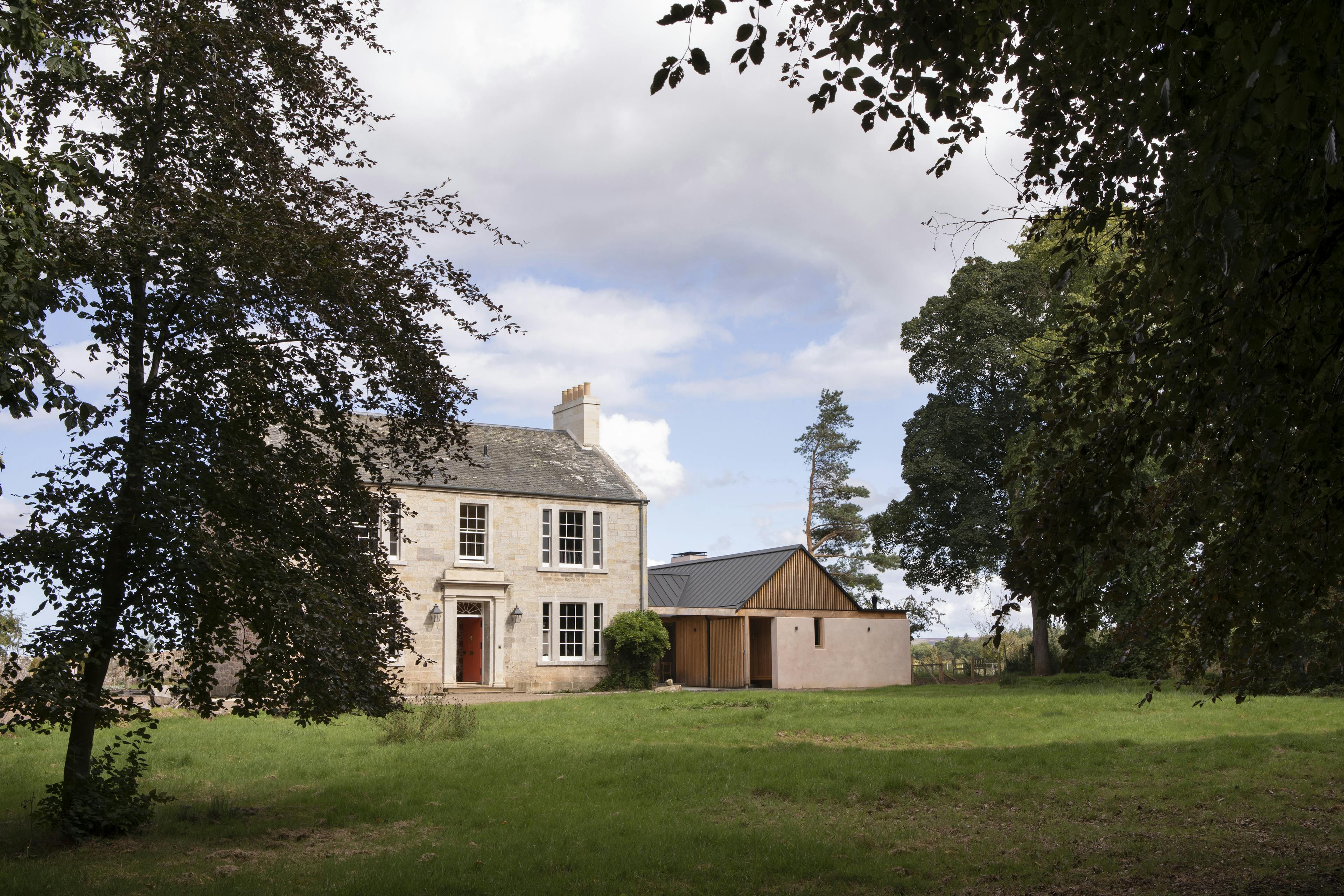 Douglas fir framed extension to a Georgian country manor house set in a large garden