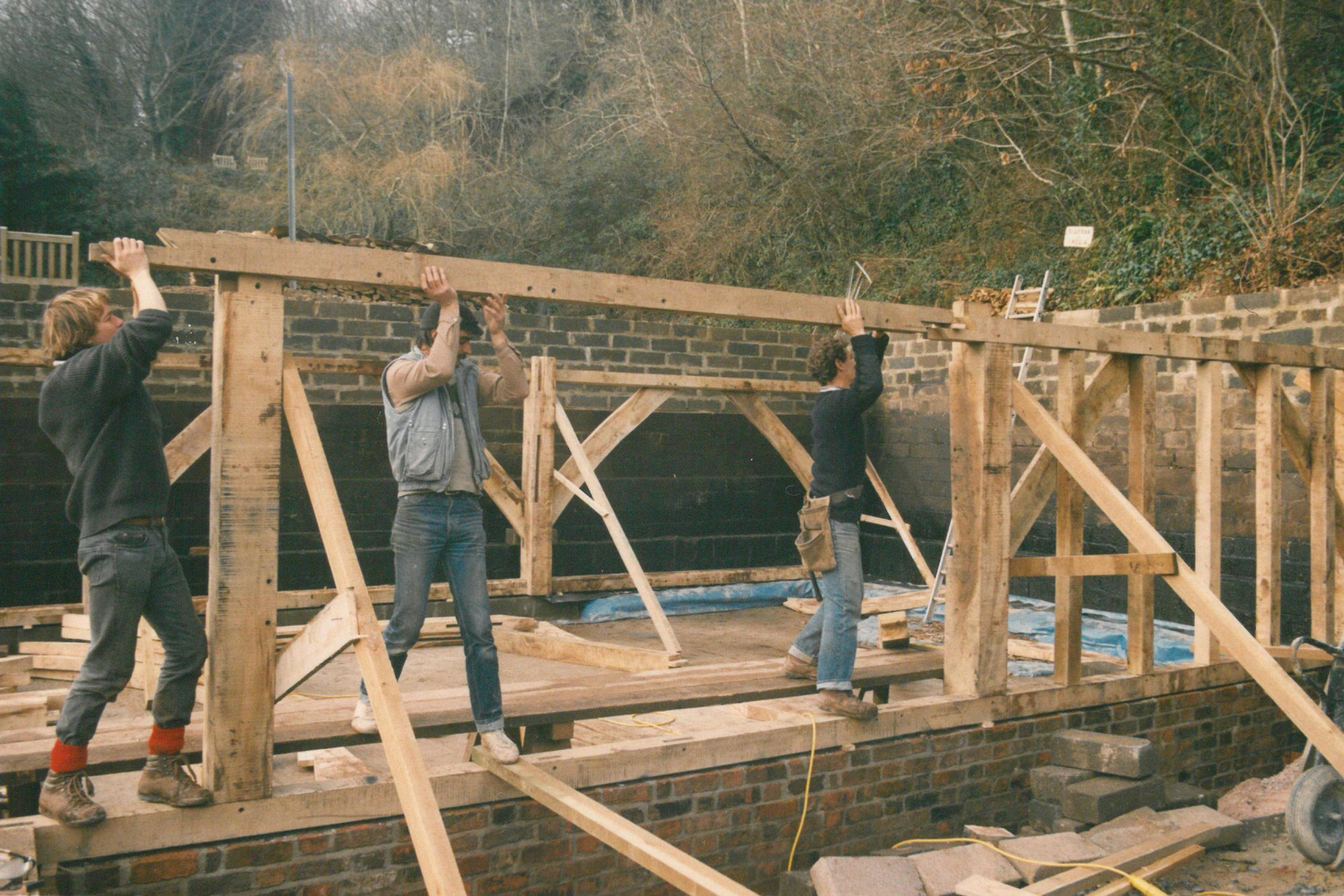 Installation of an oak framed home with a cruck truss