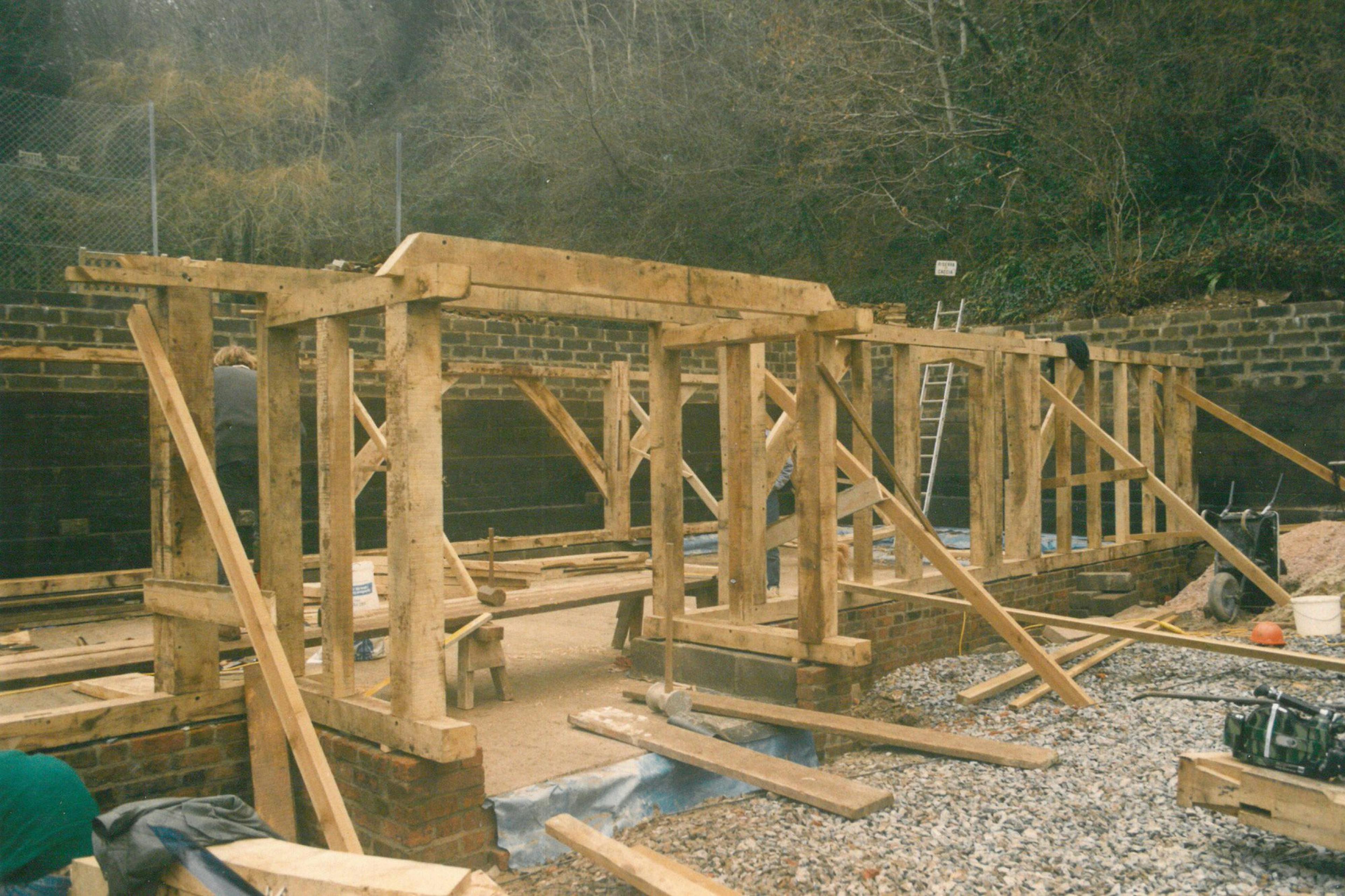 Installation of an oak framed home with a cruck truss